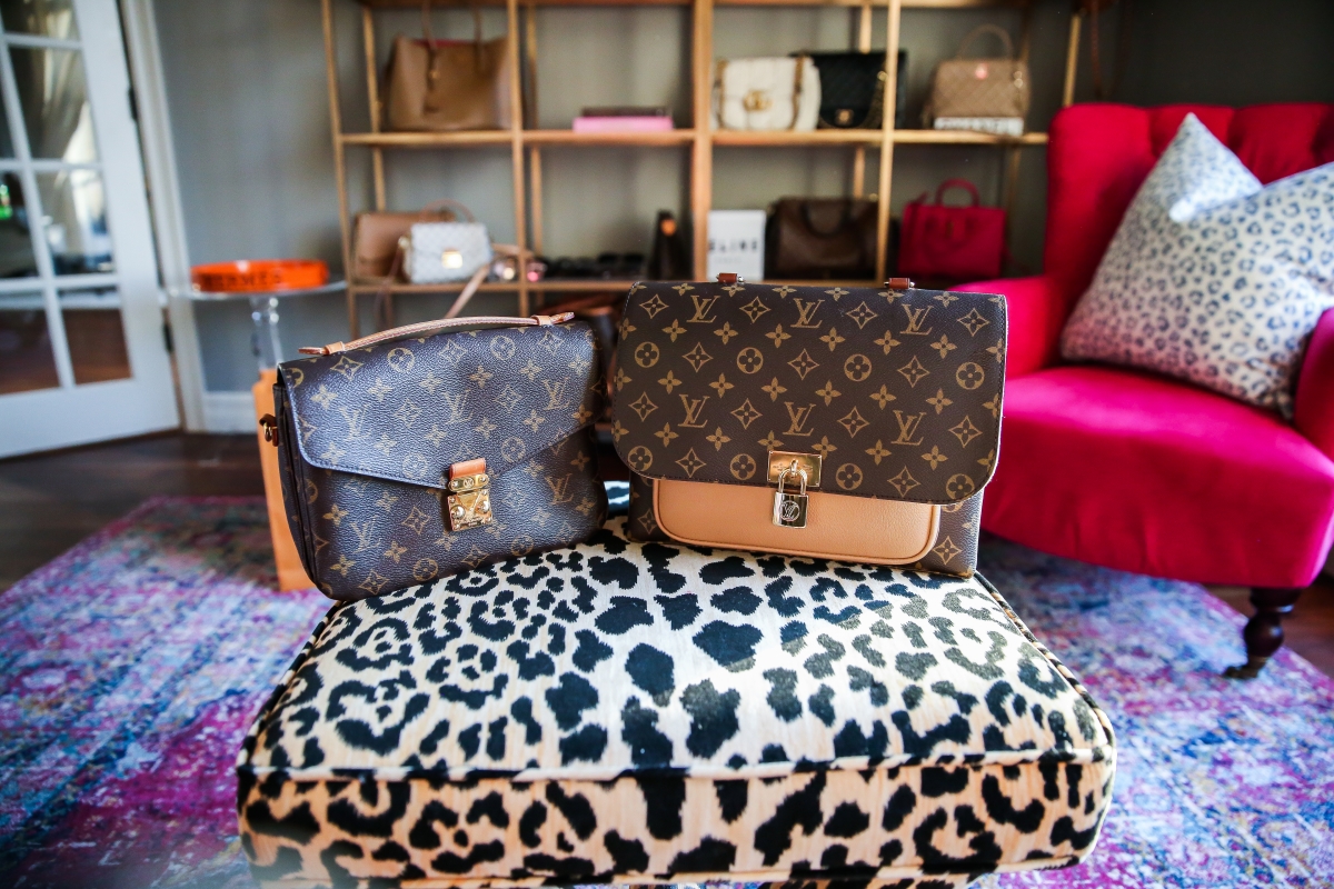 Louis Vuitton Marignan by popular US fashion blog, The Sweetest Thing: image of the Louis Vuitton Marignan messenger bag on a leopard print bench.