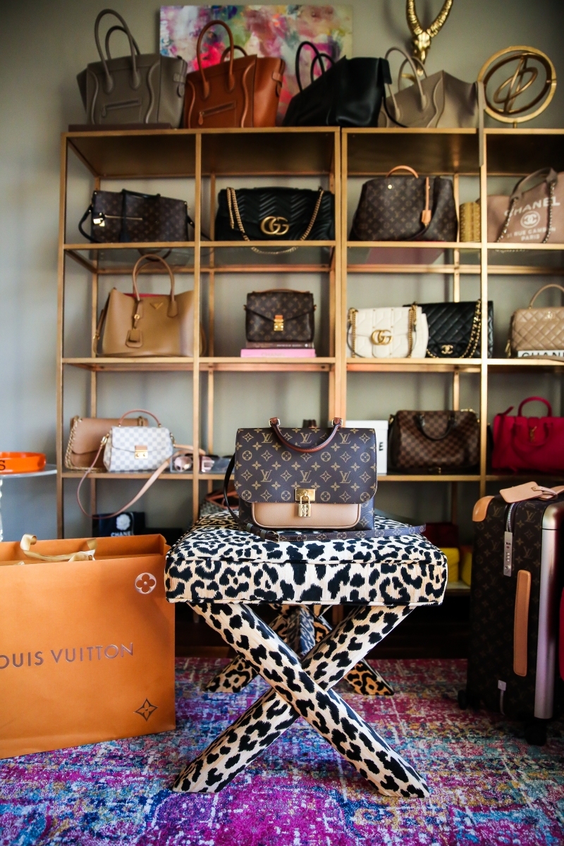 Louis Vuitton Marignan by popular US fashion blog, The Sweetest Thing: image of the Louis Vuitton Marignan messenger bag on a leopard print bench.