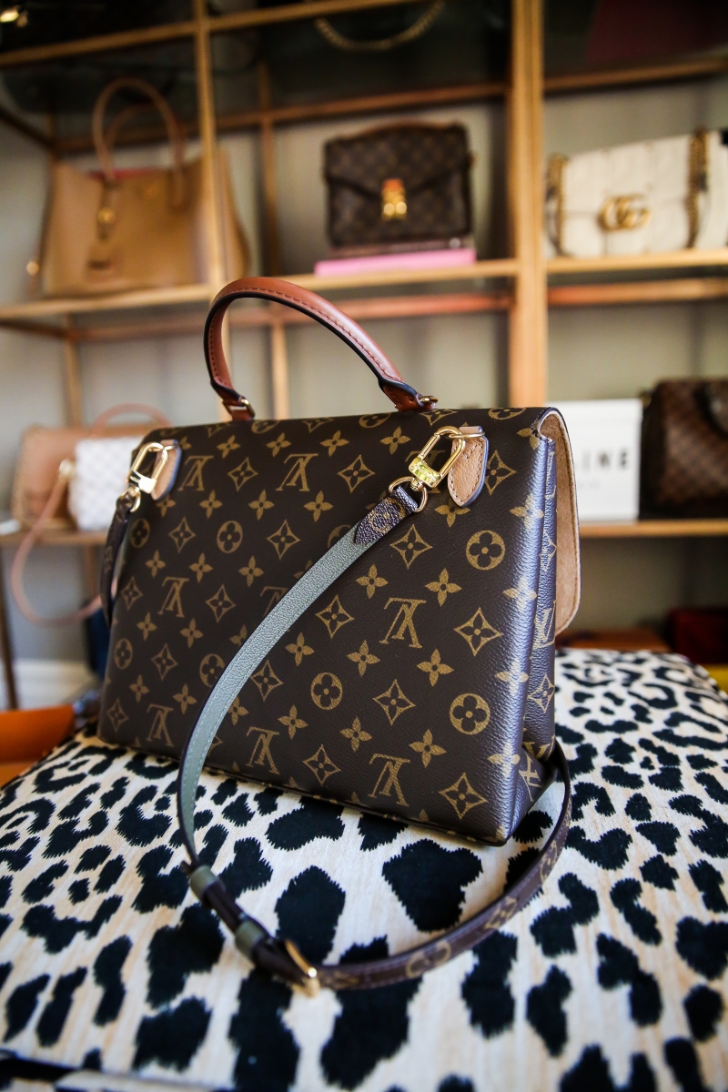 Louis Vuitton Marignan by popular US fashion blog, The Sweetest Thing: image of the Louis Vuitton Marignan messenger bag on a leopard print bench.