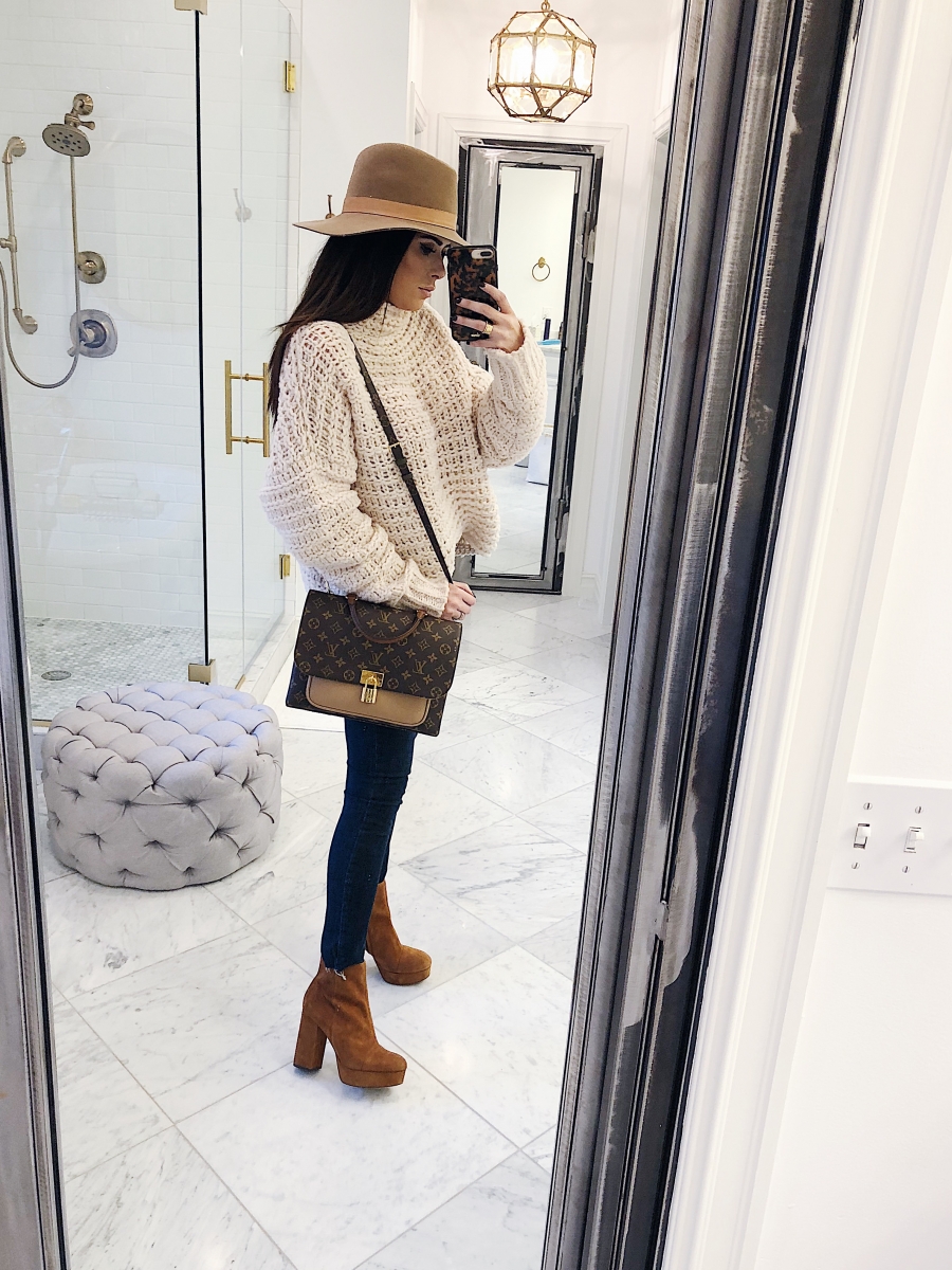 Louis Vuitton Marignan by popular US fashion blog, The Sweetest Thing: image of a woman wearing a Free People sweater, Free People Reagan Button Front Jean, ShopBop Sam Edelman Azra Platform Booties, Louis Vuitton Marignan and a Janessa Leone hat. 
