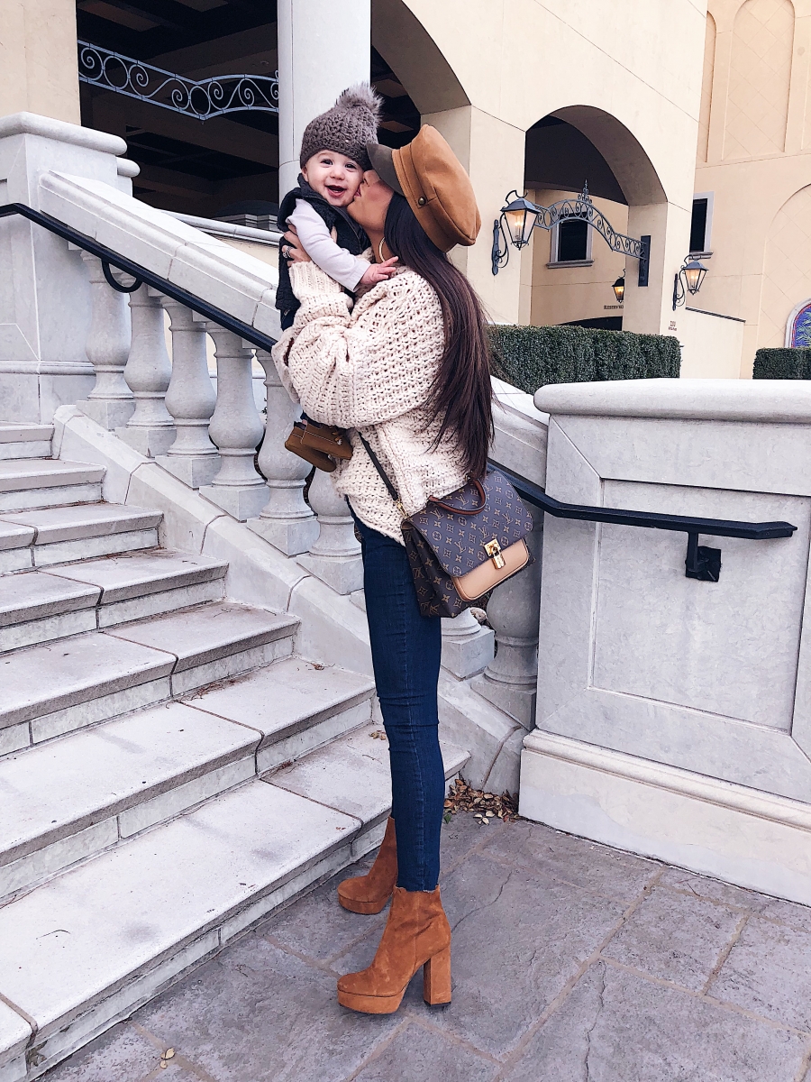 Louis Vuitton Marignan by popular US fashion blog, The Sweetest Thing: image of a woman wearing a Free People sweater, Free People Reagan Button Front Jean, ShopBop Sam Edelman Azra Platform Booties, Louis Vuitton Marignan.