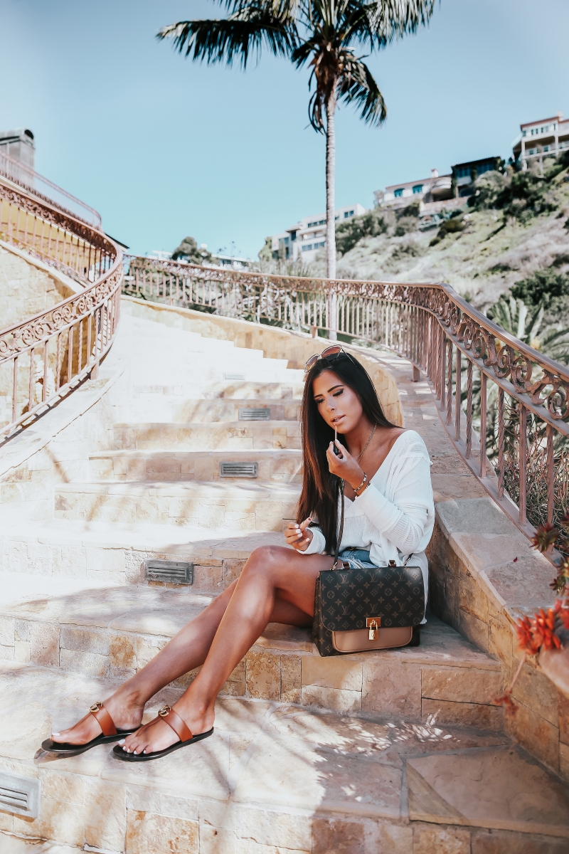 https://www.thesweetestthingblog.com/wp-content/uploads/2018/02/Spring-Fashion-Pinterest-2018-topshop-ripped-mini-denim-skirt-laguna-beach-fashion-blog-travel-blogger-tan-gucci-sandals-louis-vuitton-messenger.jpg