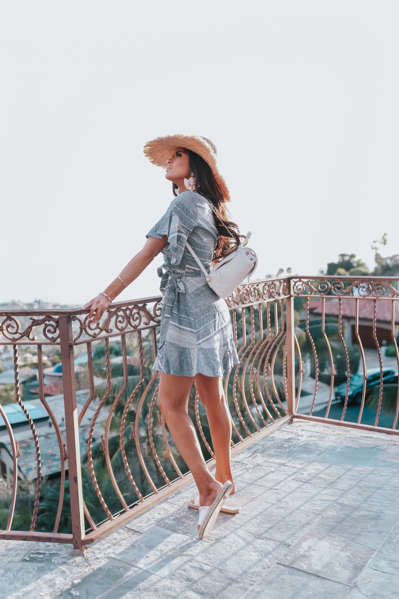 Emily Ann Gemma, The Sweetest Thing Blog, VACATION LOOK, THE CUTEST STATEMENT EARRINGS, Vacation 2018 Pinterest, Vacation outfit 2018 Pinterest, Straw hat, Chanel backpack, Chanel backpack 2018 Pinterest, White Chanel backpack, statement earrings, Express statement earrings, Express striped dress, Chanel flats, Express linen dress