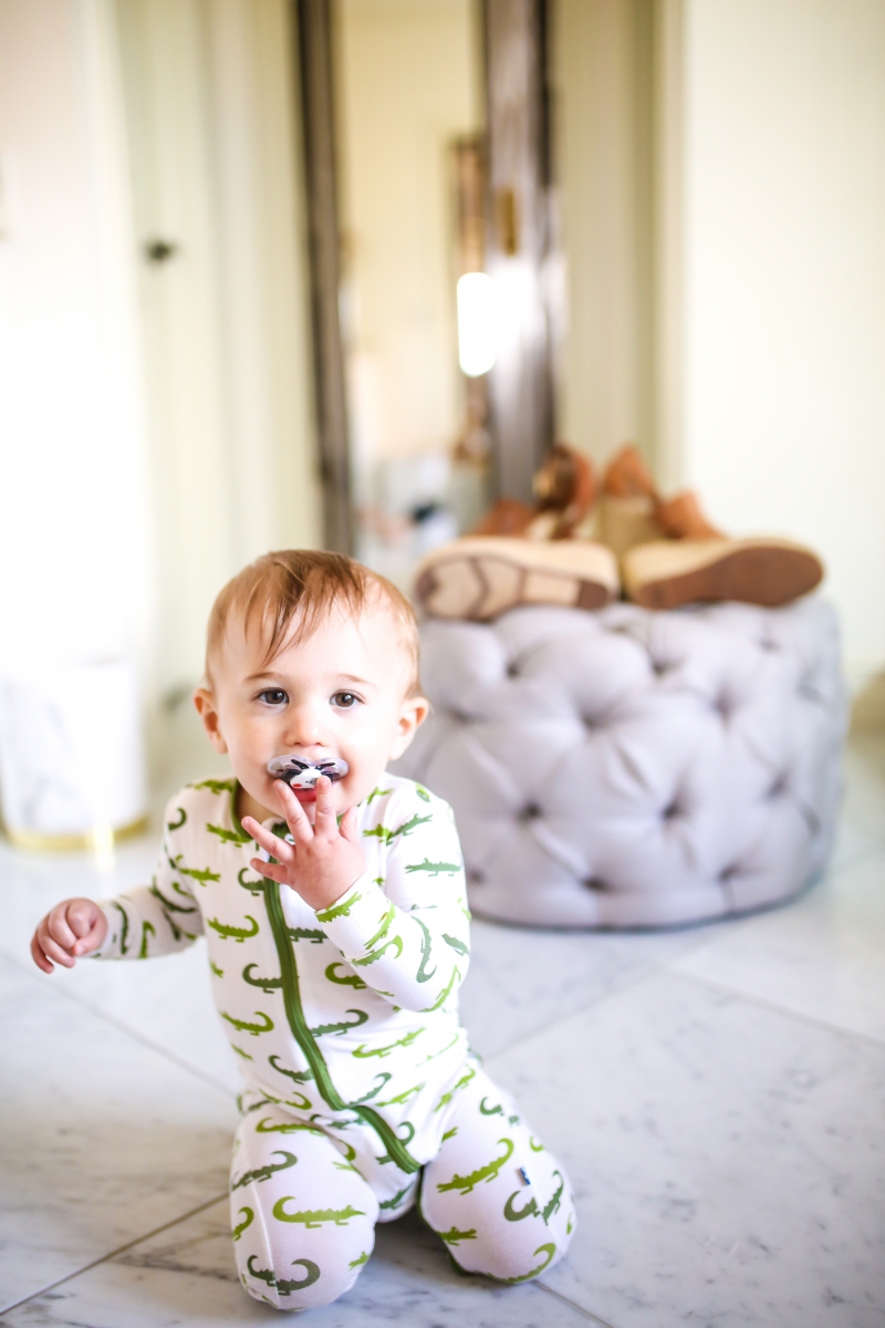 Cute Spring Shoes by popular US fashion blog, The Sweetest Thing: image of a baby wearing a crocodile onesie. 