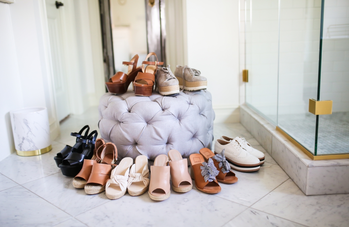 Cute Spring Shoes by popular US fashion blog, The Sweetest Thing: image of various cute spring shoes stacked up and around a tufted ottoman. 