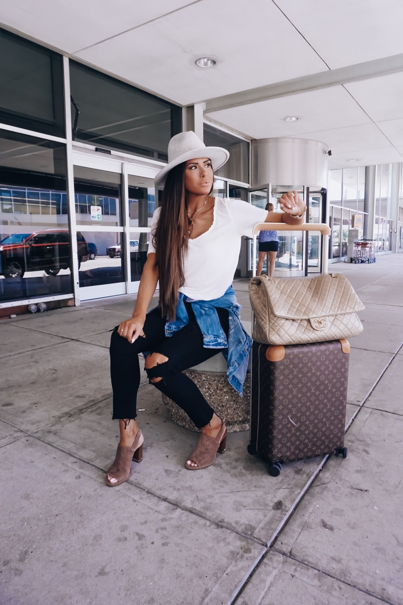 cute airplane travel outfit, airplane travel outfit idea, pinterest airplane travel outfit idea, emily ann gemma, chanel XXL airlines bag, Louis vuittton horizon 55 carry on, lack of color mack hat