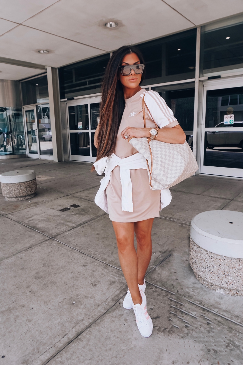 20 Easy To Re-Create Cute Travel Outfits featured by top US fashion and travel blogger, Emily Gemma of The Sweetest Thing: cute airport outfit idea fashion pinterest 2018, adidas dress outfit travel idea, airport travel fashion fall