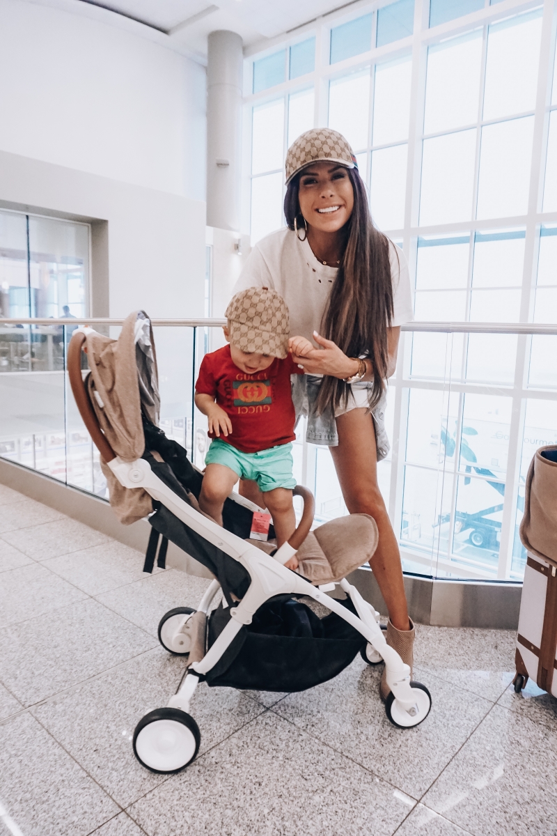 20 Easy To Re-Create Cute Travel Outfits featured by top US fashion and travel blogger, Emily Gemma of The Sweetest Thing: cute airport travel fashion outfit fall 2018, emily gemma travel style, stylish cute casual travel outfit idea 2018, XL chanel bag airline tote gold, baby sing travel stroller reivew