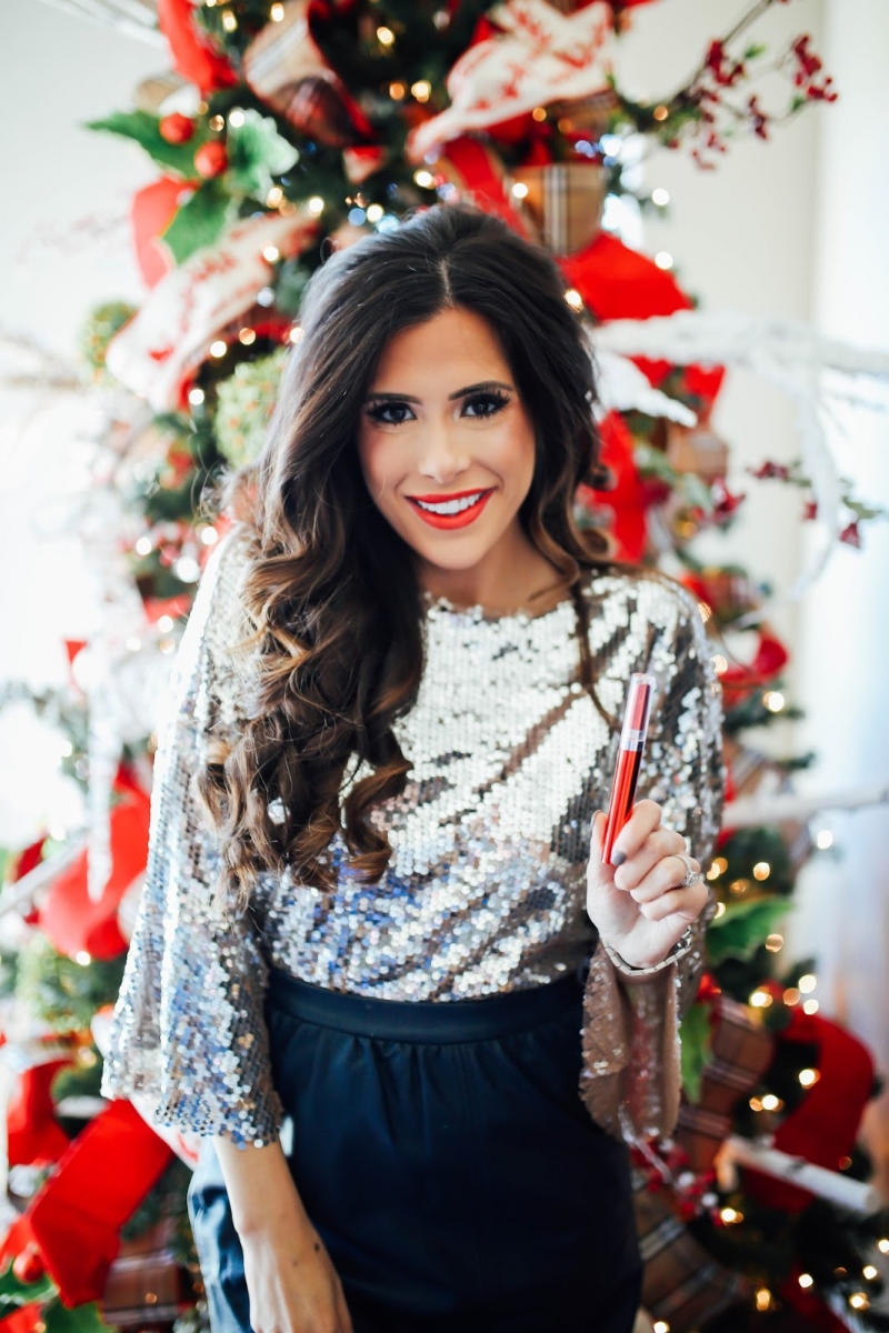 sequin top 2018 pinterest outfit inspiration | Sequin Leggings Outfit by popular US fashion blog, The Sweetest Thing: image of a woman wearing a silver sequin top.