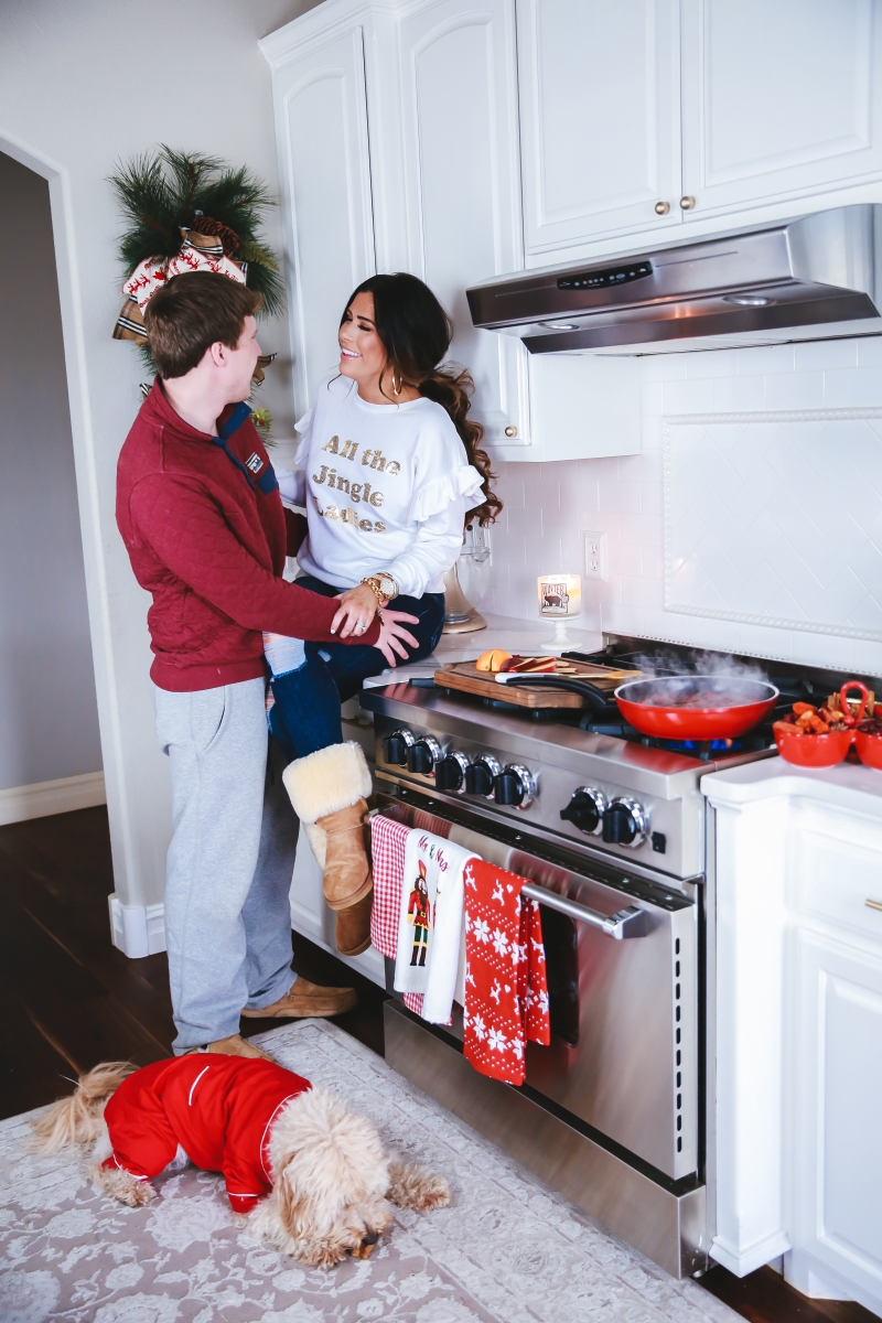 stovetop-potpourri-christmas-scent-simmering-stovestop-potpourri-recipe-christmas-smell-emily-ann-gemma-the-sweetest-thing-21 | Sequin Leggings Outfit by popular US fashion blog, The Sweetest Thing: image of a woman wearing a sequin sweatshirt.