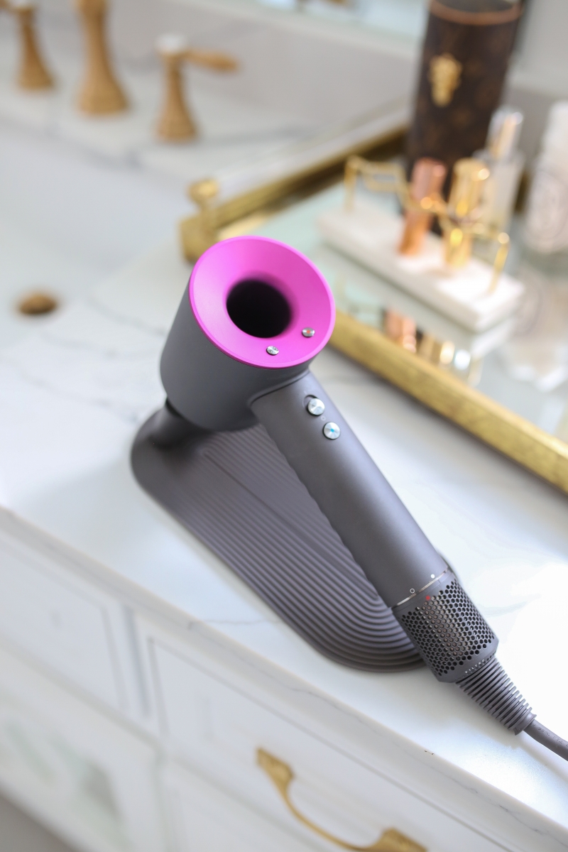 Emily Ann Gemma of The Sweetest Thing Blog review of the Dyson Hair Dryer. | Dyson Hair Dryer by popular US beauty blog, The Sweetest Thing: image of a Dyson Hair Dryer.