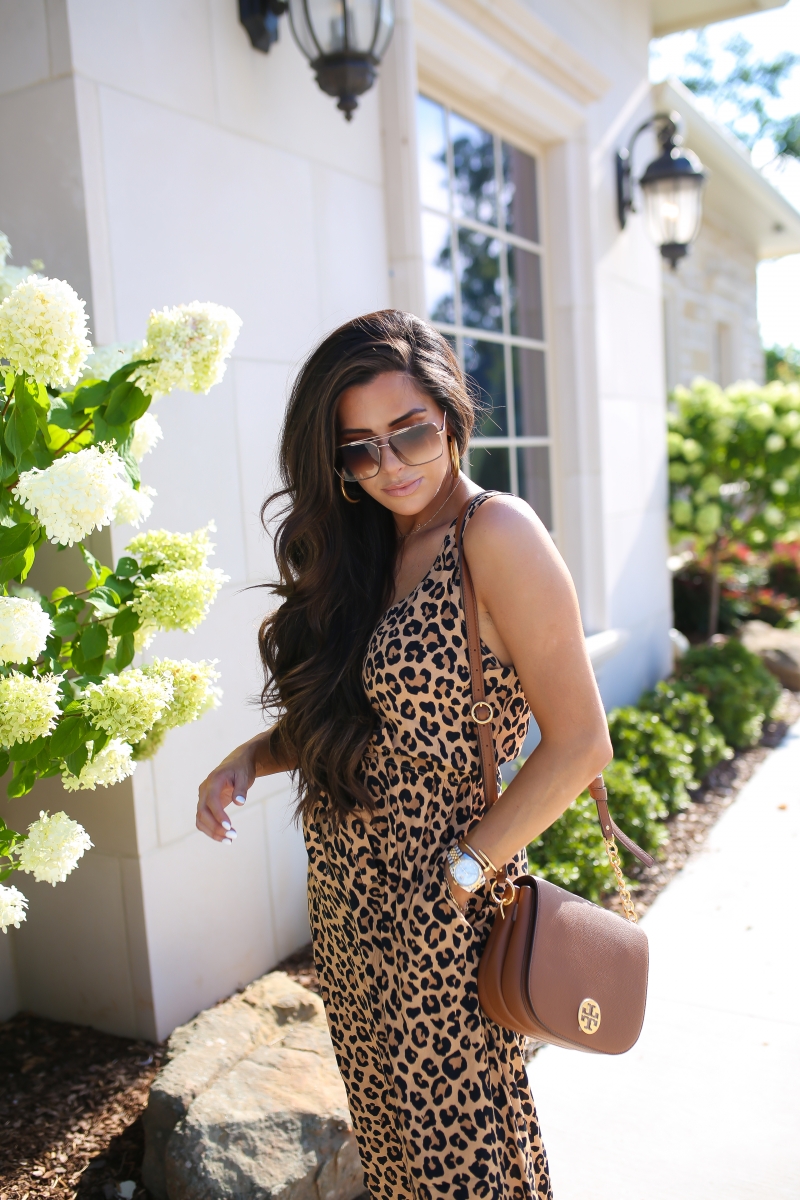 Emily Ann Gemma of The Sweetest Thing Blog wearing The Cutest Leopard Midi Dress [NSALE]. Tory Burch purse, brown heels, hoop earrings.