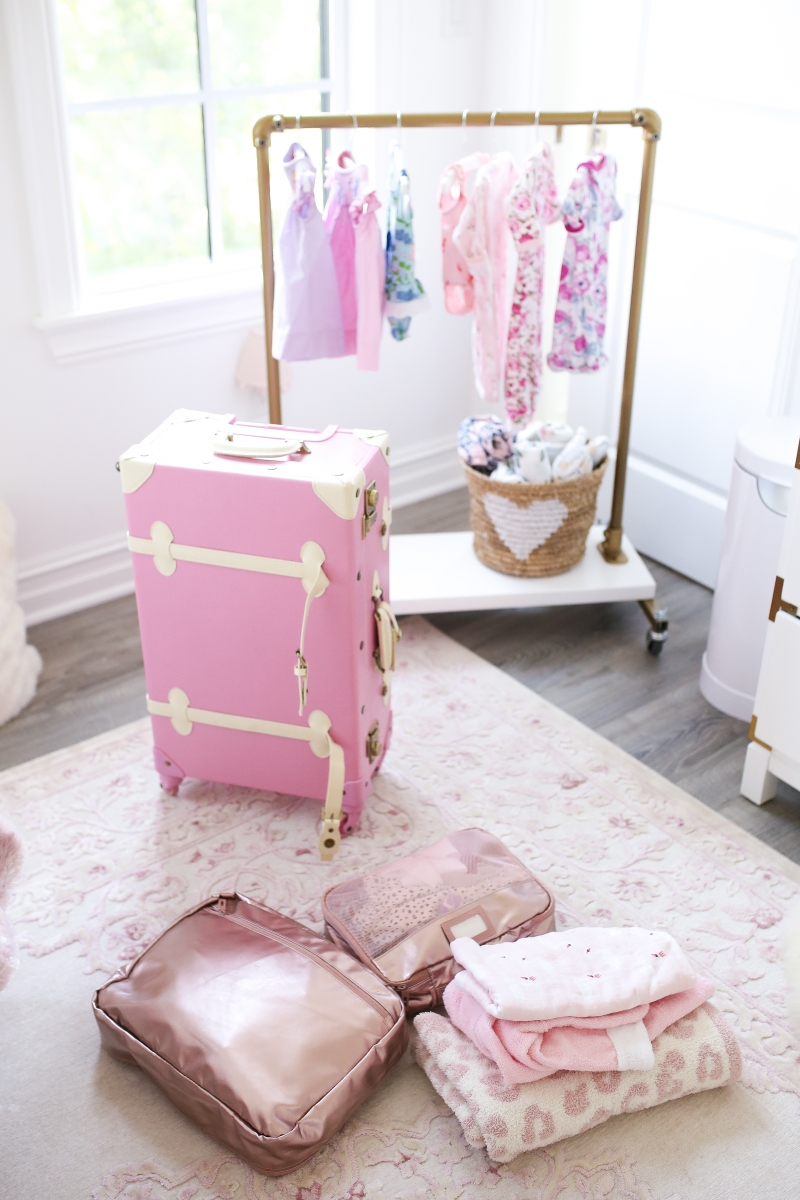 Emily Ann Gemma of The Sweetest Thing shares her Must-Haves For Travel Packing For The Family. Packing for baby and toddler.