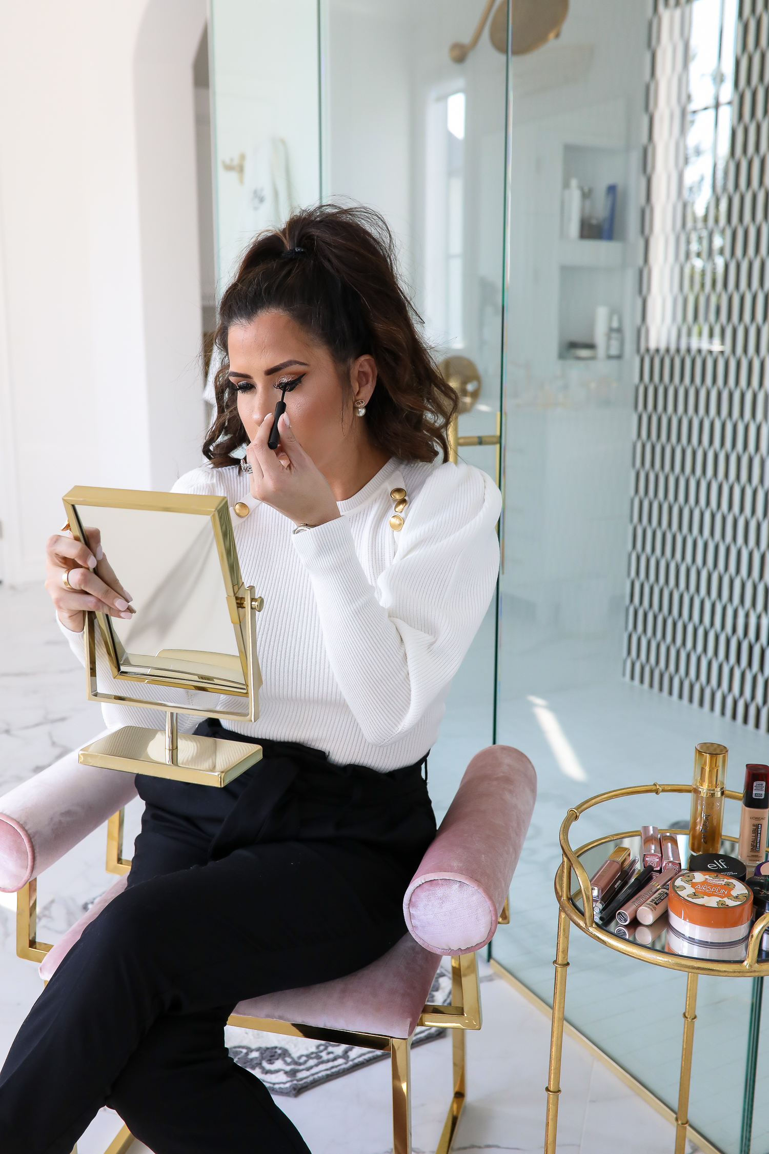 best drug store makeup fall 2019, popular beauty bloggers 2019, best drugstore makeup 2019, emily ann gemma-2 | Best Drugstore Makeup by popular US beauty blog, The Sweetest Thing: image of a woman applying liquid eyeliner. 