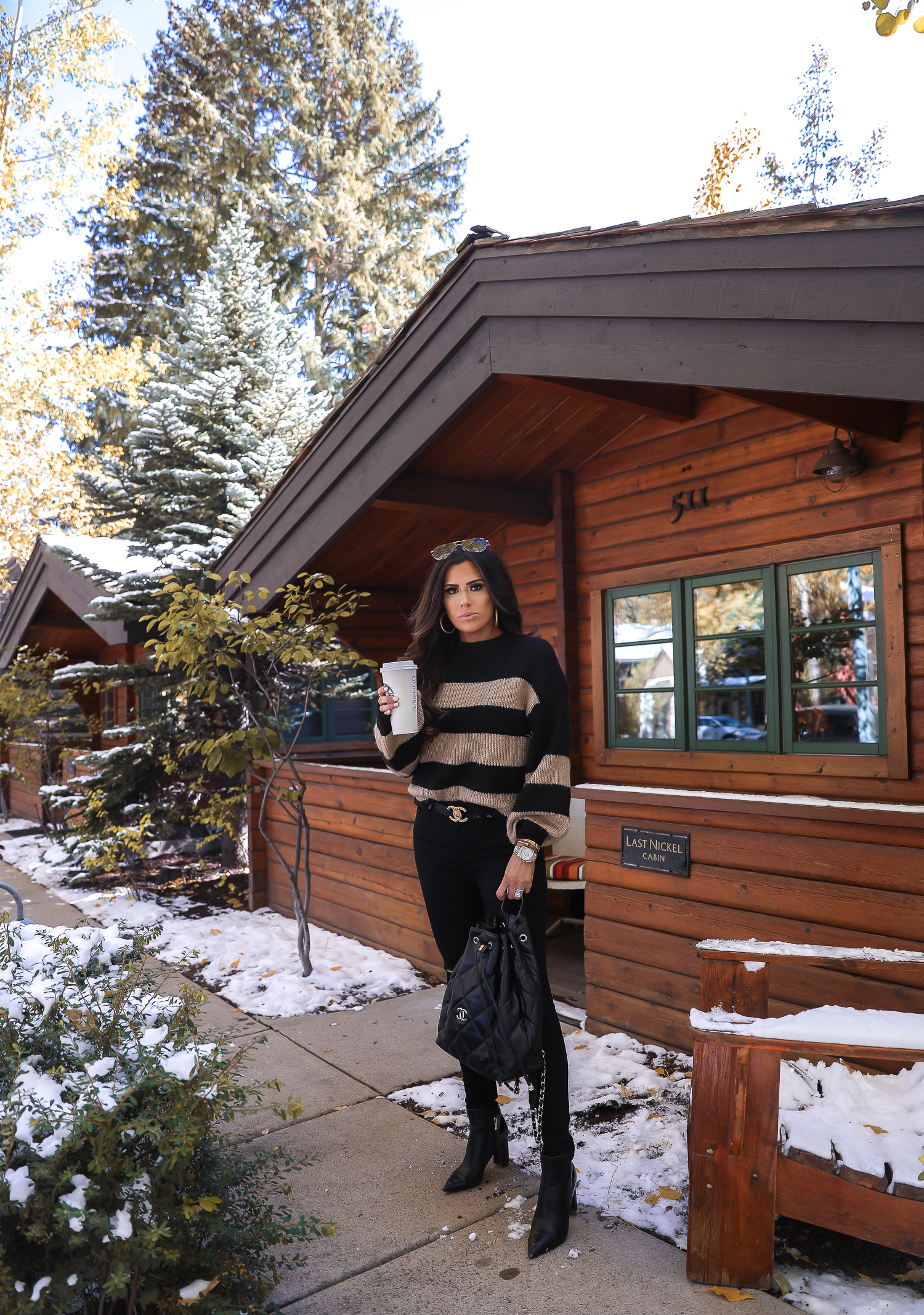 Easy Fall Look styled by top US fashion blog, The Sweetest Thing: image of a woman wearing a Nordstrom striped sweater, Madewell jeans, Marc Fisher booties, Chanel belt, and a Rolex watch | Fall outift ideas 2019 pinterest, Aspen what to wear fall, black chanel backpack quilted 2019, quay rimless aviator black, emily gemma, top popular fall fashion bloggers-2