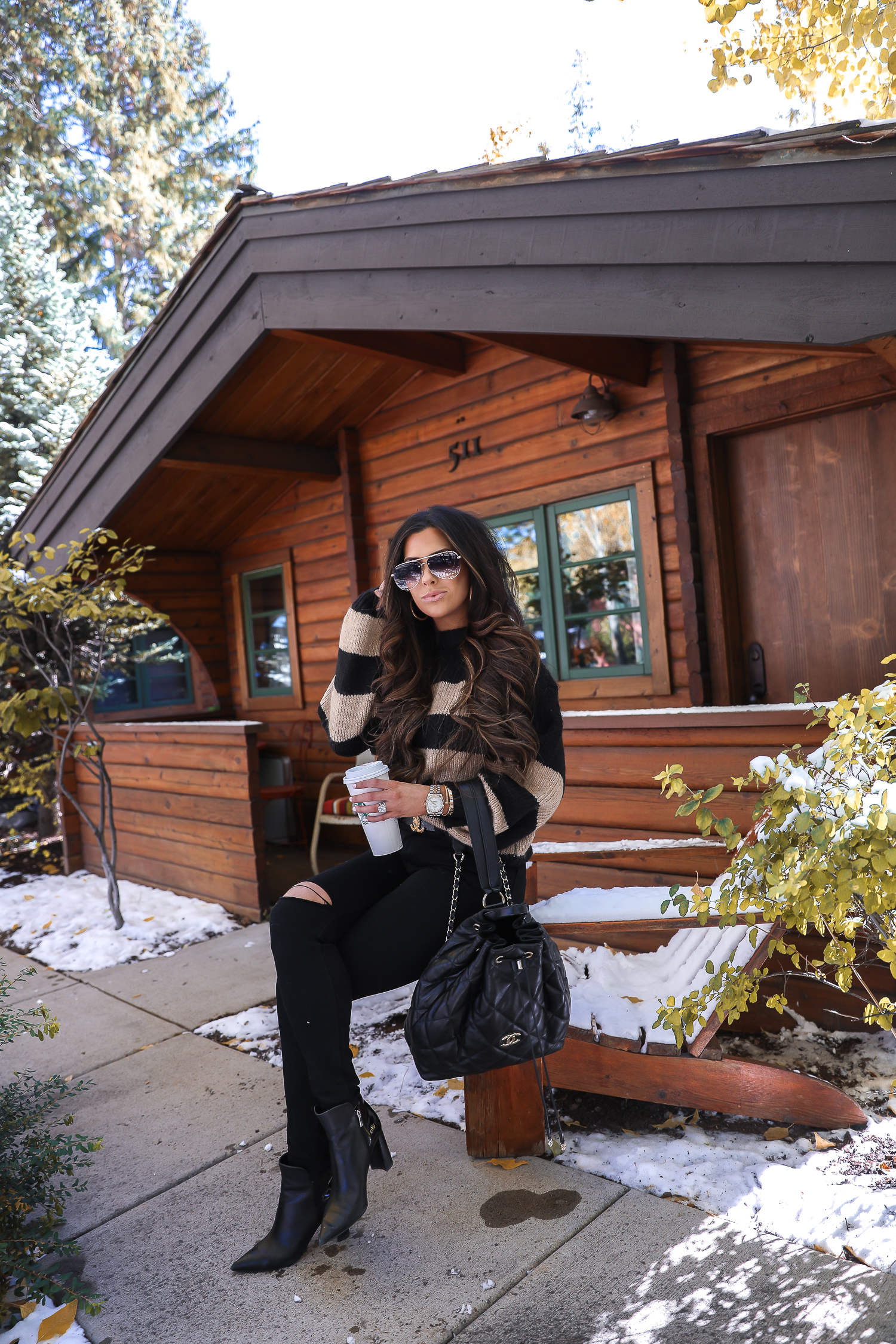 Easy Fall Look styled by top US fashion blog, The Sweetest Thing: image of a woman wearing a Nordstrom striped sweater, Madewell jeans, Marc Fisher booties, Chanel belt, and a Rolex watch | Fall outift ideas 2019 pinterest, Aspen what to wear fall, black chanel backpack quilted 2019, quay rimless aviator black, emily gemma, top popular fall fashion bloggers-2