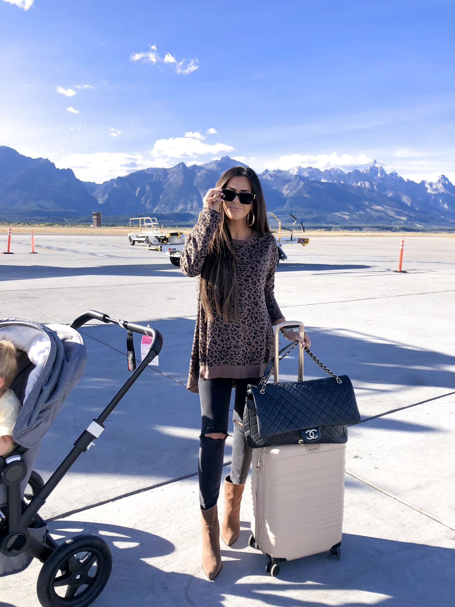 The Best Things to Do in Jackson Hole in the Fall featured by top US travel blog, The Sweetest Thing | cute fall fashion airport travel outfit idea, emily gemma, chanel XXL airline tote, louis vuitton millionaire sunglasses