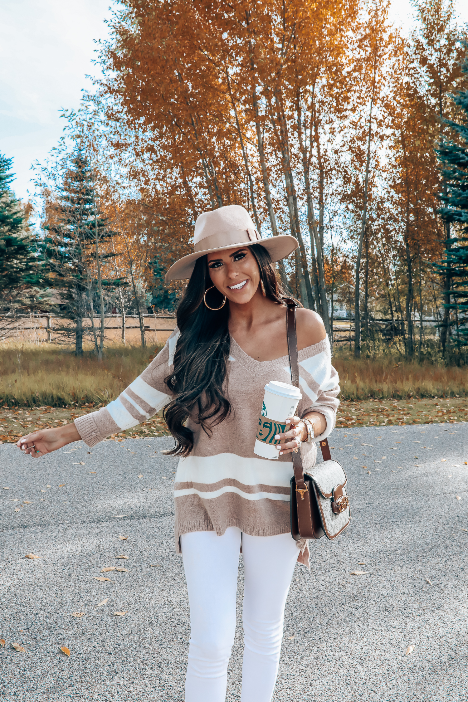 Rag and Bone White Jeans style for Fall by top US fashion blog, The Sweetest Thing: image of a woman wearing Rag and Bone white denim jeans, a Red Dress Boutique off the shoulder striped sweater, Gianni Bini boots, Gucci 1955 shoulder bag, Brixton Panama hat, Rolex watch, Cartier bracelets, Argento Vivo earrings, and a Free People ring | fall fashion outfits pinterest 2019, gucci vintage 1955 bag, fall outfits white denim, red dress boutique sweater, brixton hats-5