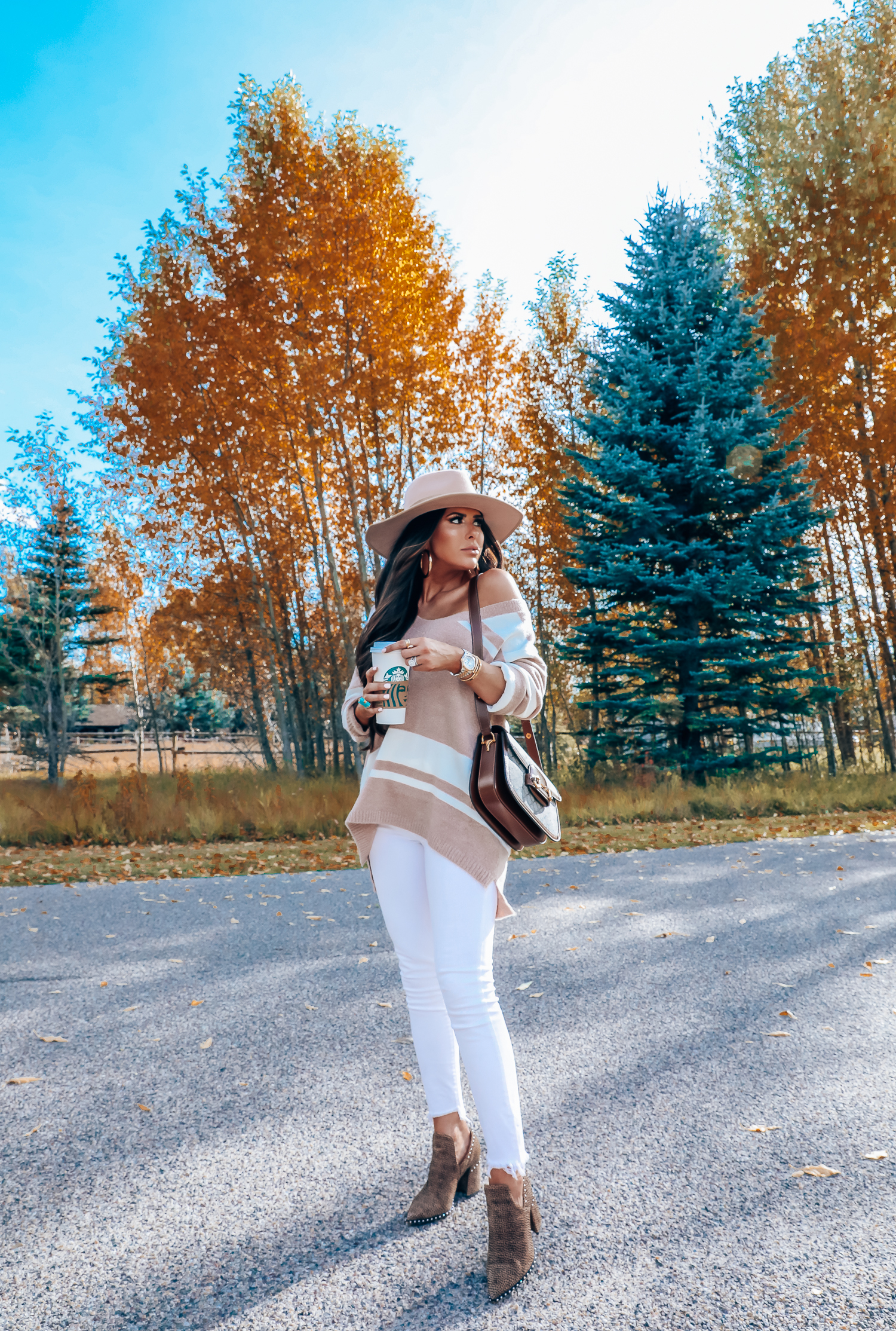 Rag and Bone White Jeans style for Fall by top US fashion blog, The Sweetest Thing: image of a woman wearing Rag and Bone white denim jeans, a Red Dress Boutique off the shoulder striped sweater, Gianni Bini boots, Gucci 1955 shoulder bag, Brixton Panama hat, Rolex watch, Cartier bracelets, Argento Vivo earrings, and a Free People ring | fall fashion outfits pinterest 2019, gucci vintage 1955 bag, fall outfits white denim, red dress boutique sweater, brixton hats-5