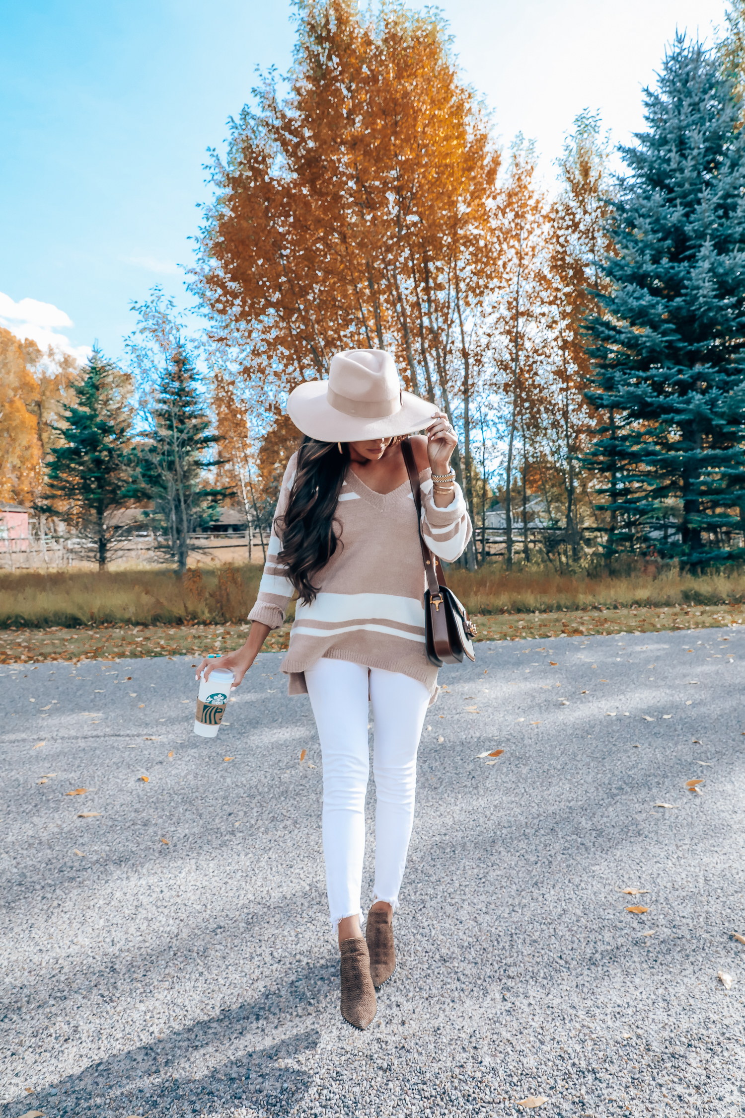 Rag and Bone White Jeans style for Fall by top US fashion blog, The Sweetest Thing: image of a woman wearing Rag and Bone white denim jeans, a Red Dress Boutique off the shoulder striped sweater, Gianni Bini boots, Gucci 1955 shoulder bag, Brixton Panama hat, Rolex watch, Cartier bracelets, Argento Vivo earrings, and a Free People ring | fall fashion outfits pinterest 2019, gucci vintage 1955 bag, fall outfits white denim, red dress boutique sweater, brixton hats-5