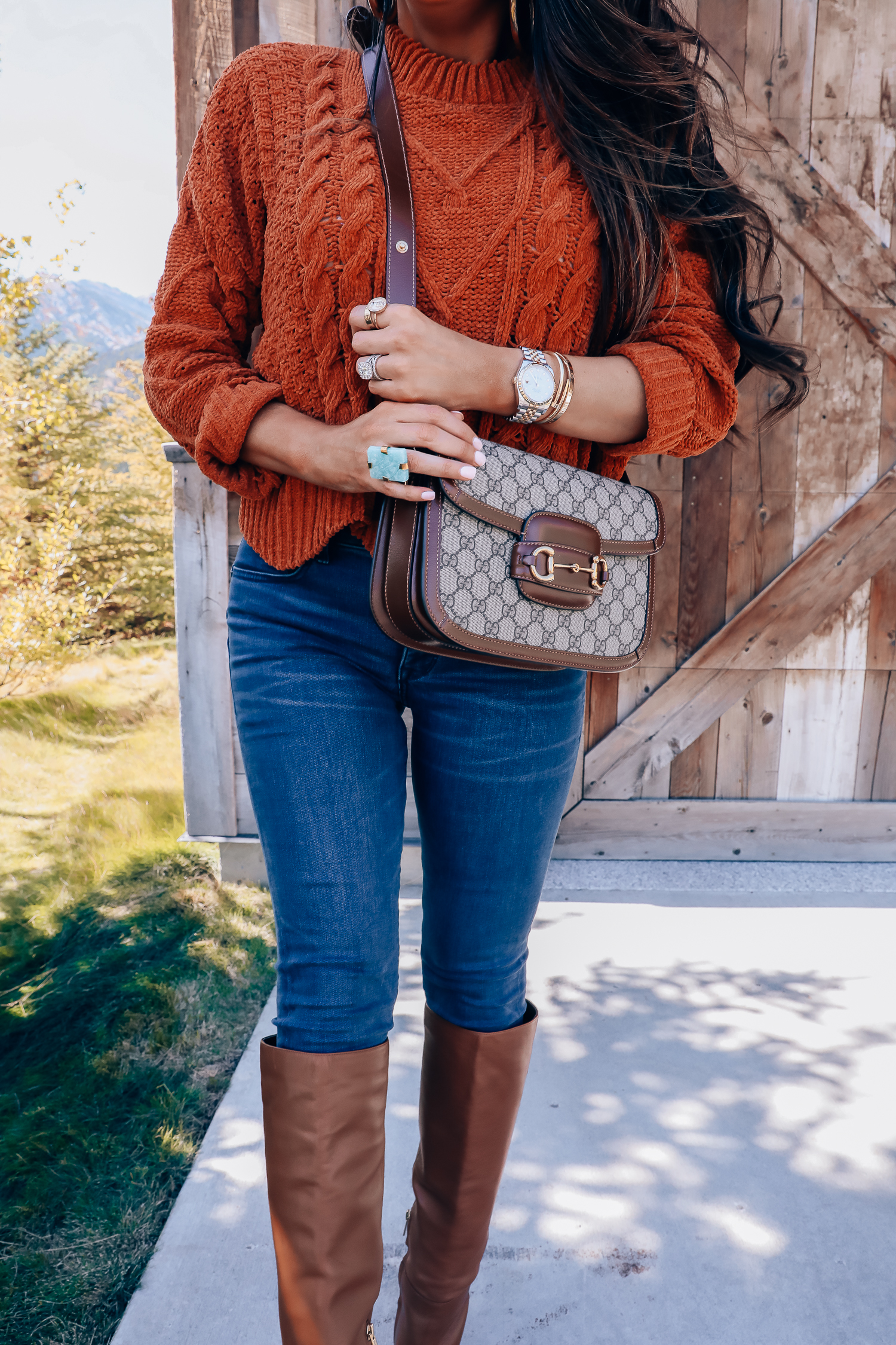 Fall fashion outfit featured by top US fashion blog, The Sweetest Thing: image of a woman wearing a BlankNYC rust sweater, Express denim leggings, Sam Edelman boots, Gucci 1955 shoulder bag, Cartie bracelets, Argento Vivo earrings, Gucci sunglasses and a Free People ring.| fall fashion outfits pinterest 2019, gucci vintage 1955 fall, emily ann gemma, sam edelman brown leather boots_-2