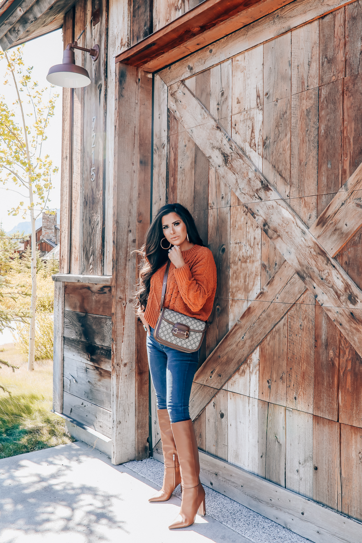 Fall fashion outfit featured by top US fashion blog, The Sweetest Thing: image of a woman wearing a BlankNYC rust sweater, Express denim leggings, Sam Edelman boots, Gucci 1955 shoulder bag, Cartie bracelets, Argento Vivo earrings, Gucci sunglasses and a Free People ring. | fall fashion outfits pinterest 2019, gucci vintage 1955 fall, emily ann gemma, sam edelman brown leather boots_-2