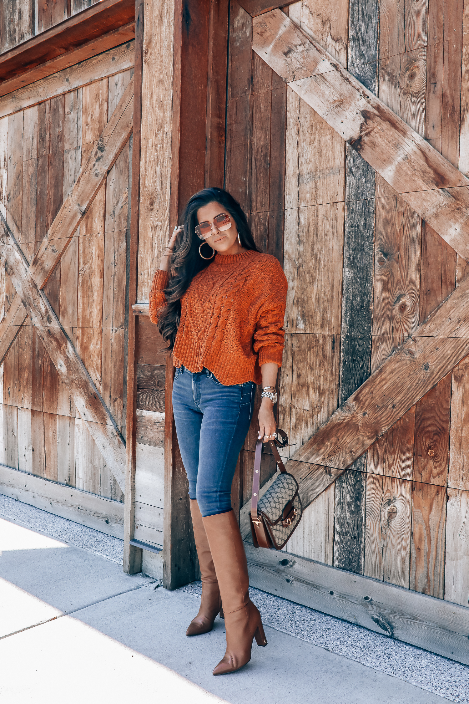 Fall fashion outfit featured by top US fashion blog, The Sweetest Thing: image of a woman wearing a BlankNYC rust sweater, Express denim leggings, Sam Edelman boots, Gucci 1955 shoulder bag, Cartie bracelets, Argento Vivo earrings, Gucci sunglasses and a Free People ring.| fall fashion outfits pinterest 2019, gucci vintage 1955 fall, emily ann gemma, sam edelman brown leather boots_-2
