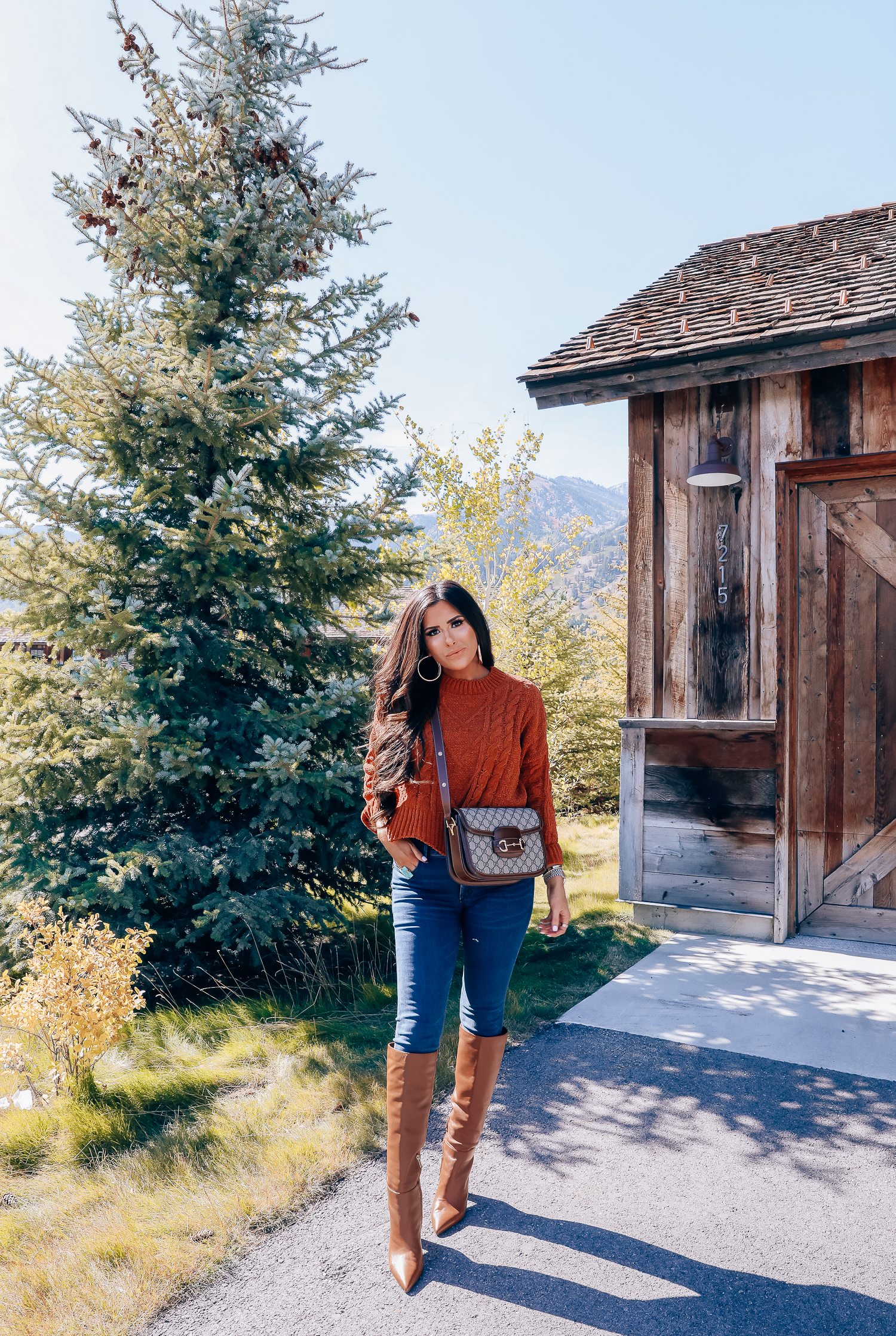 Fall fashion outfit featured by top US fashion blog, The Sweetest Thing: image of a woman wearing a BlankNYC rust sweater, Express denim leggings, Sam Edelman boots, Gucci 1955 shoulder bag, Cartie bracelets, Argento Vivo earrings, Gucci sunglasses and a Free People ring | fall fashion outfits pinterest 2019, gucci vintage 1955 fall, emily ann gemma, sam edelman brown leather boots_-2