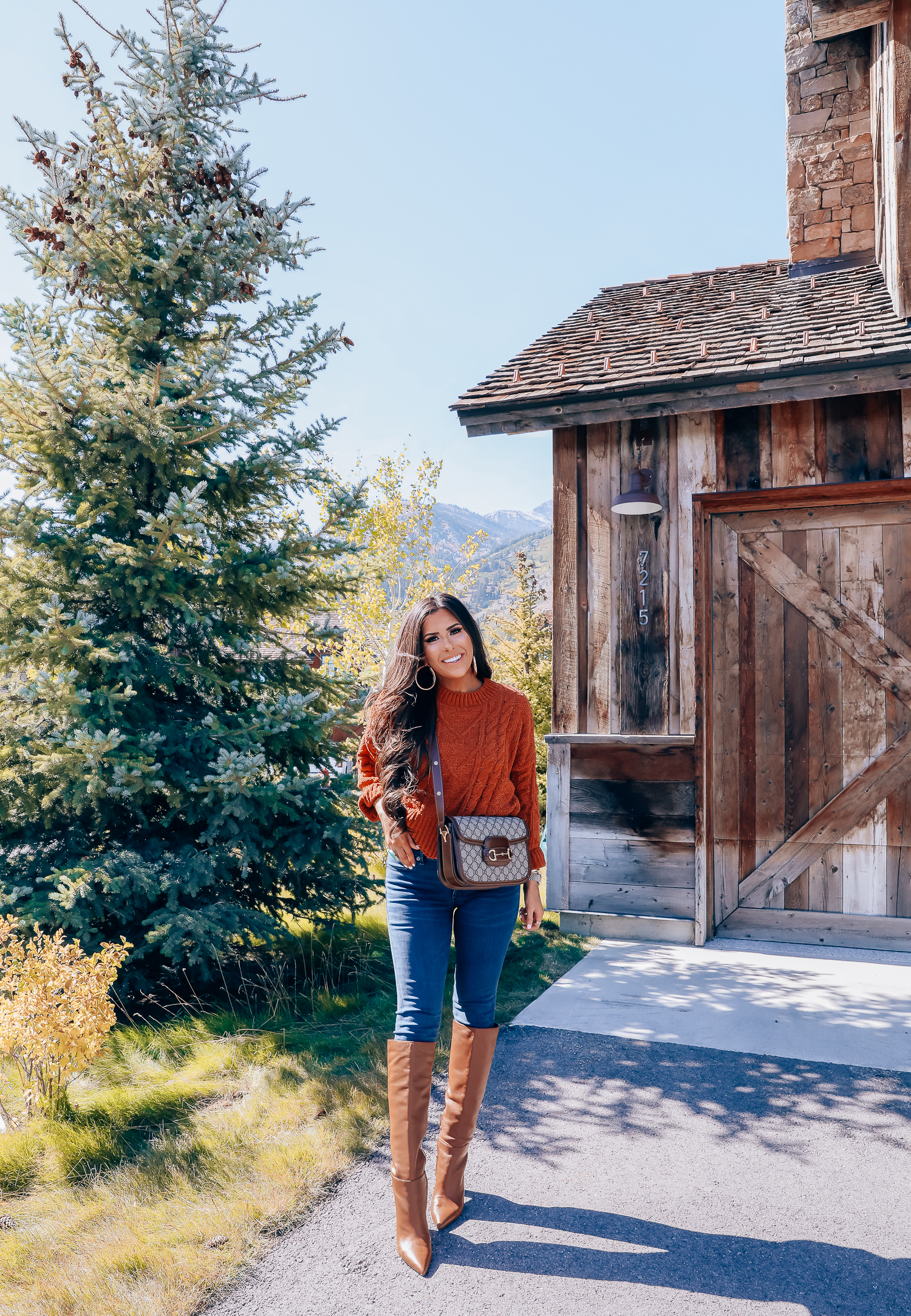 Fall fashion outfit featured by top US fashion blog, The Sweetest Thing: image of a woman wearing a BlankNYC rust sweater, Express denim leggings, Sam Edelman boots, Gucci 1955 shoulder bag, Cartie bracelets, Argento Vivo earrings, Gucci sunglasses and a Free People ring.| fall fashion outfits pinterest 2019, gucci vintage 1955 fall, emily ann gemma, sam edelman brown leather boots_-2