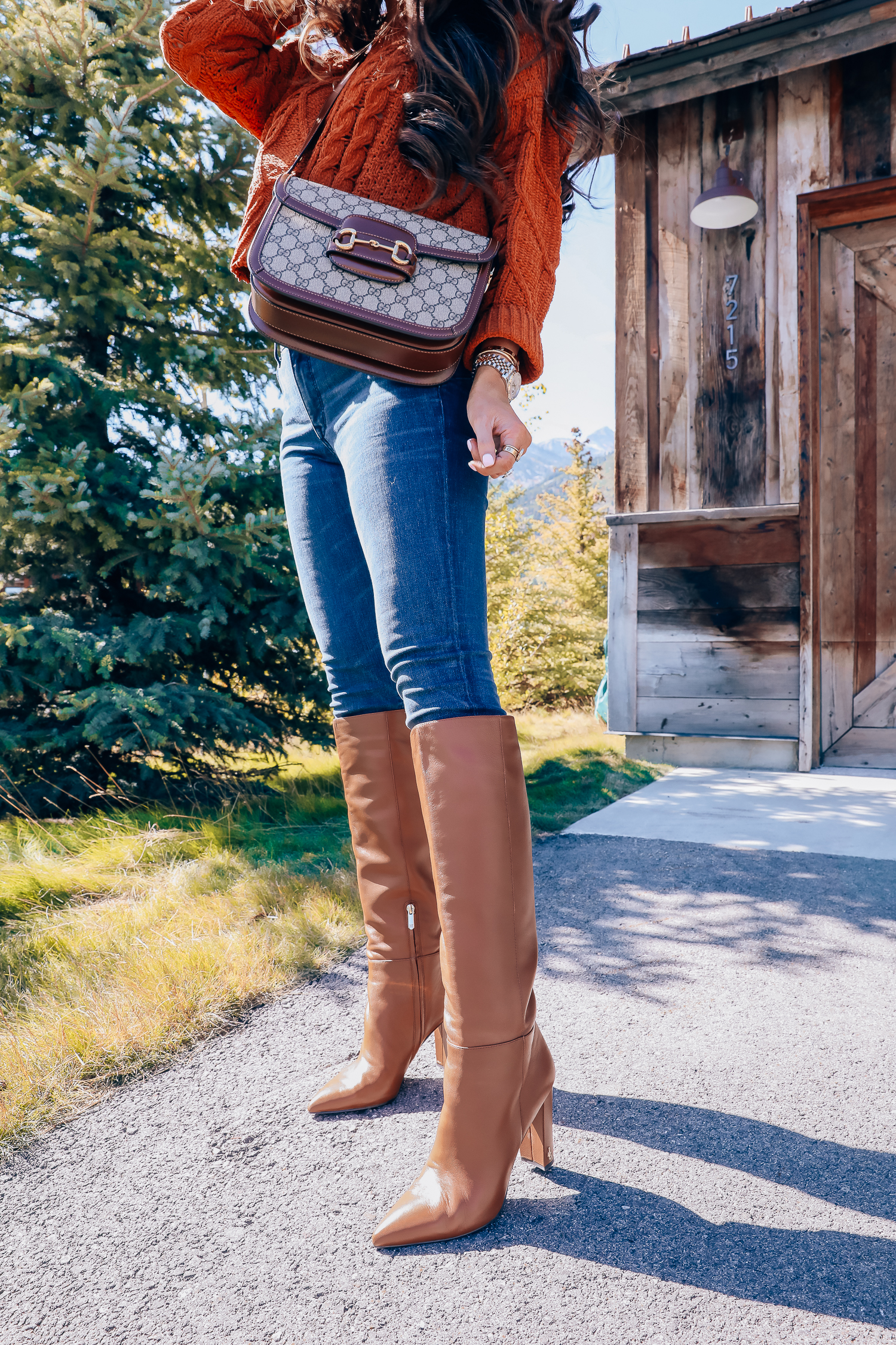 Fall fashion outfit featured by top US fashion blog, The Sweetest Thing: image of a woman wearing a BlankNYC rust sweater, Express denim leggings, Sam Edelman boots, Gucci 1955 shoulder bag, Cartie bracelets, Argento Vivo earrings, Gucci sunglasses and a Free People ring.| fall fashion outfits pinterest 2019, gucci vintage 1955 fall, emily ann gemma, sam edelman brown leather boots_-2