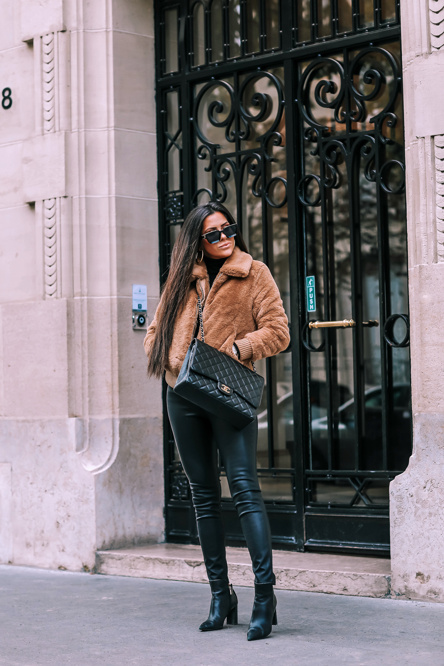 paris fall fashion 2019, fall fashion 2019, banana republic fall outfits 2019, paris outfit ideas fall and winter, what to wear in paris in october november, emily ann gemma-2 | Do You Like Neon Or Neutrals?! Two Everyday Fall Outfits by popular Oklahoma fashion blog, The Sweetest Thing: image of a woman outside in Paris and wearing a Banana Republic Faux Fur Bomber, Banana Republic Merino-Blend Funnel-Neck Sweater, and Banana Republic High-Rise Skinny Coated Jean.