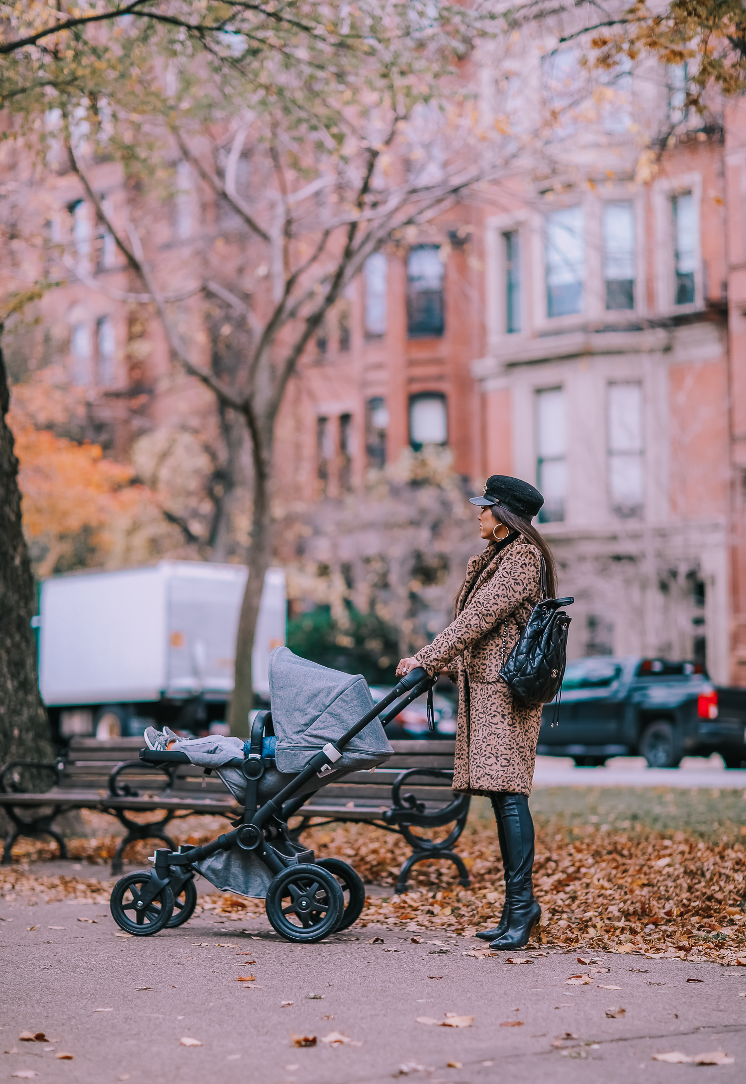 Faux Fur Leopard Coat styled by top US fashion blogger, Emily Gemma of The Sweetest Thing: image of a woman wearing a Mural faux fur leopard coat.