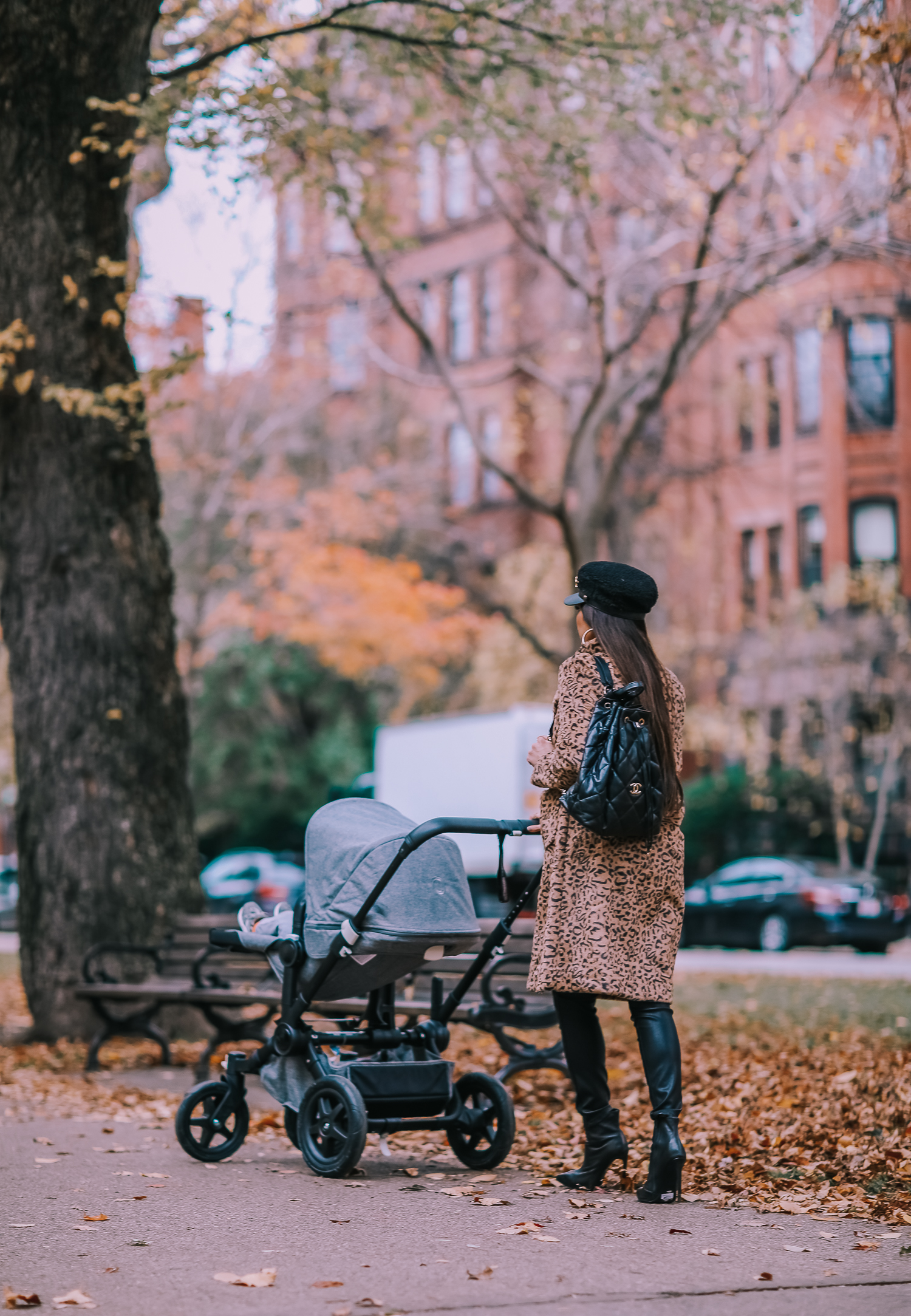 Faux Fur Leopard Coat styled by top US fashion blogger, Emily Gemma of The Sweetest Thing: image of a woman wearing a Mural faux fur leopard coat.