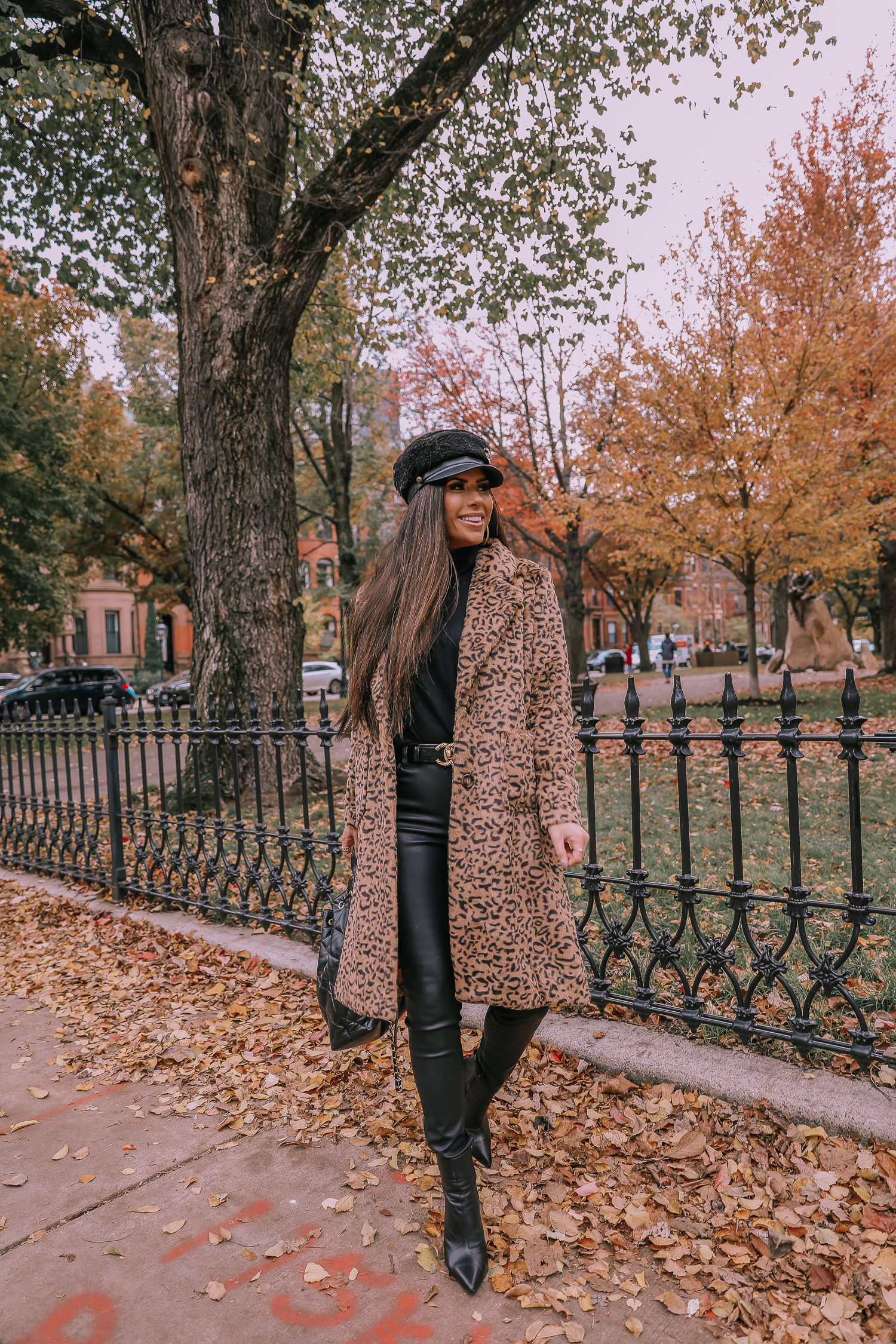 Faux Fur Leopard Coat styled by top US fashion blogger, Emily Gemma of The Sweetest Thing: image of a woman wearing a Mural faux fur leopard coat.