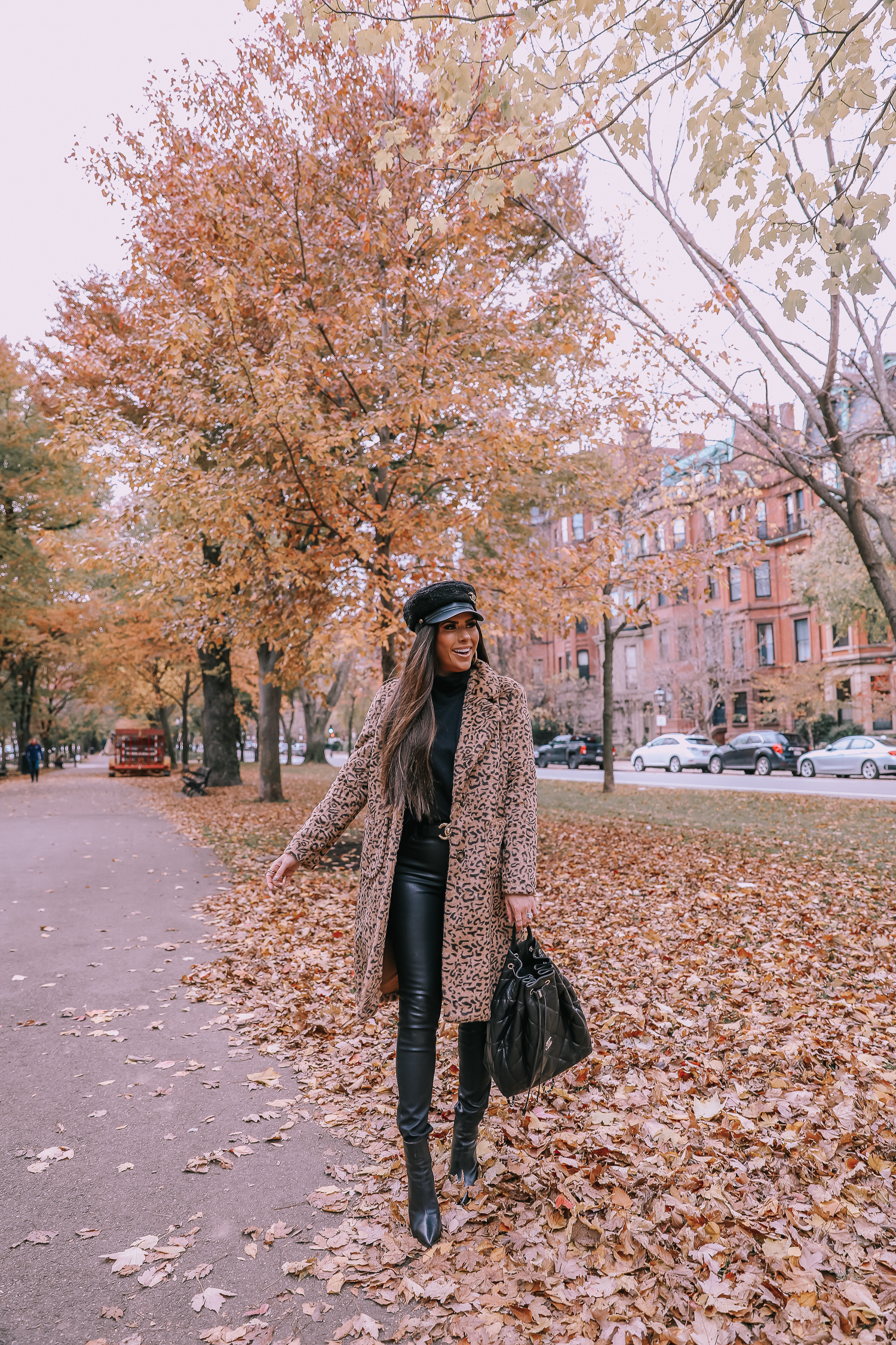 Faux Fur Leopard Coat styled by top US fashion blogger, Emily Gemma of The Sweetest Thing: image of a woman wearing a Mural faux fur leopard coat.