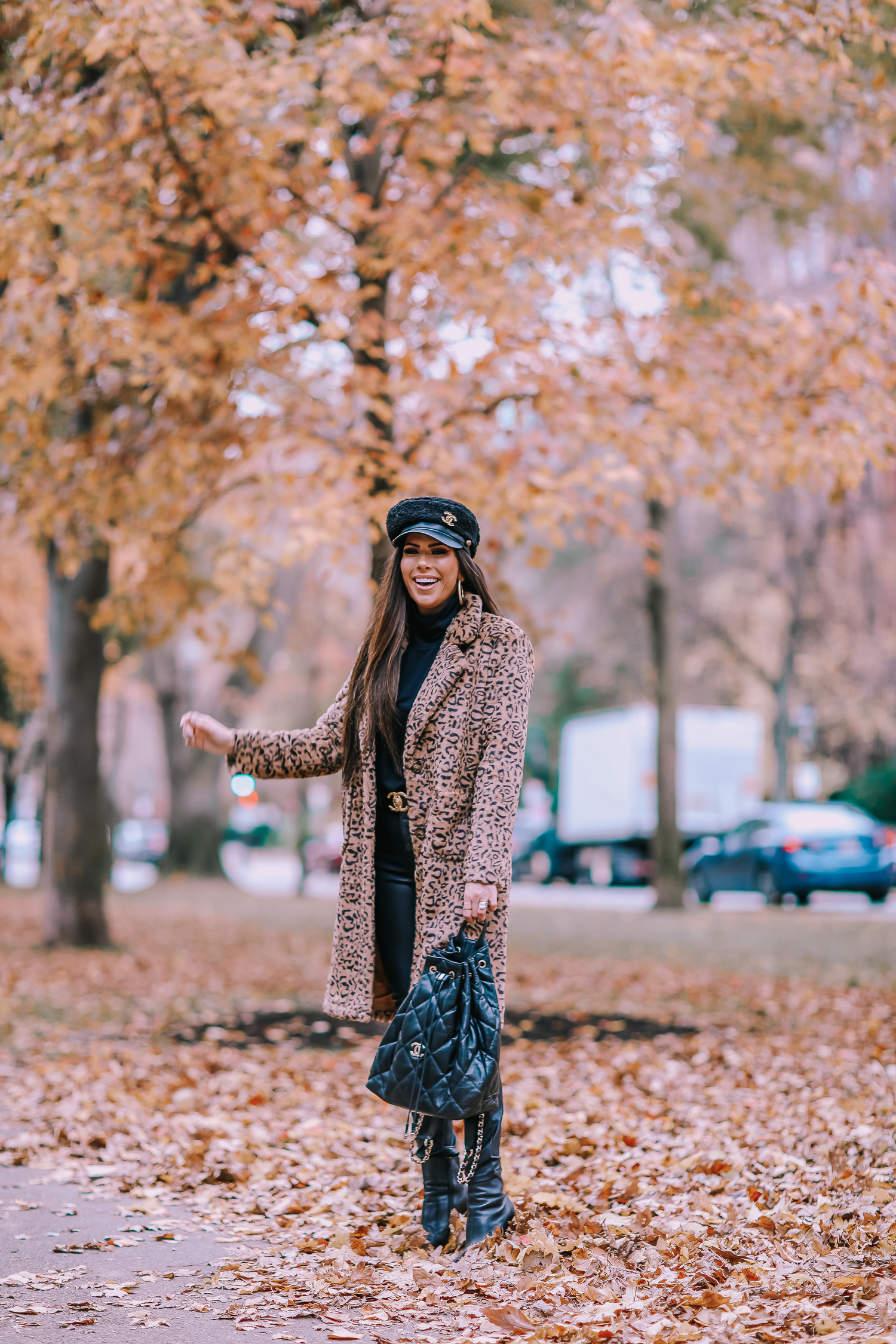 Faux Fur Leopard Coat styled by top US fashion blogger, Emily Gemma of The Sweetest Thing: image of a woman wearing a Mural faux fur leopard coat.