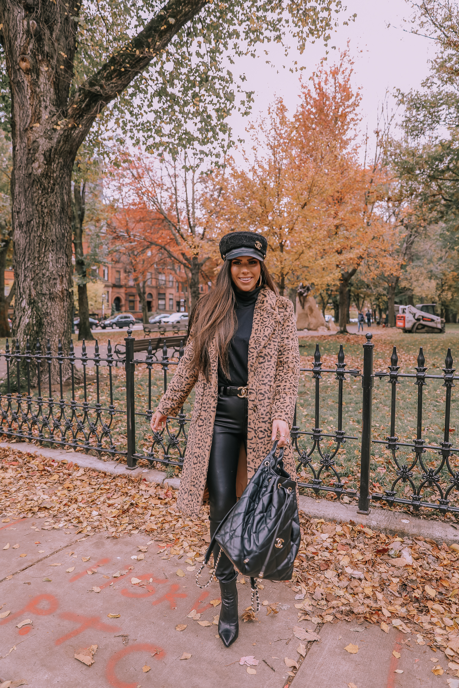 Faux Fur Leopard Coat styled by top US fashion blogger, Emily Gemma of The Sweetest Thing: image of a woman wearing a Mural faux fur leopard coat.