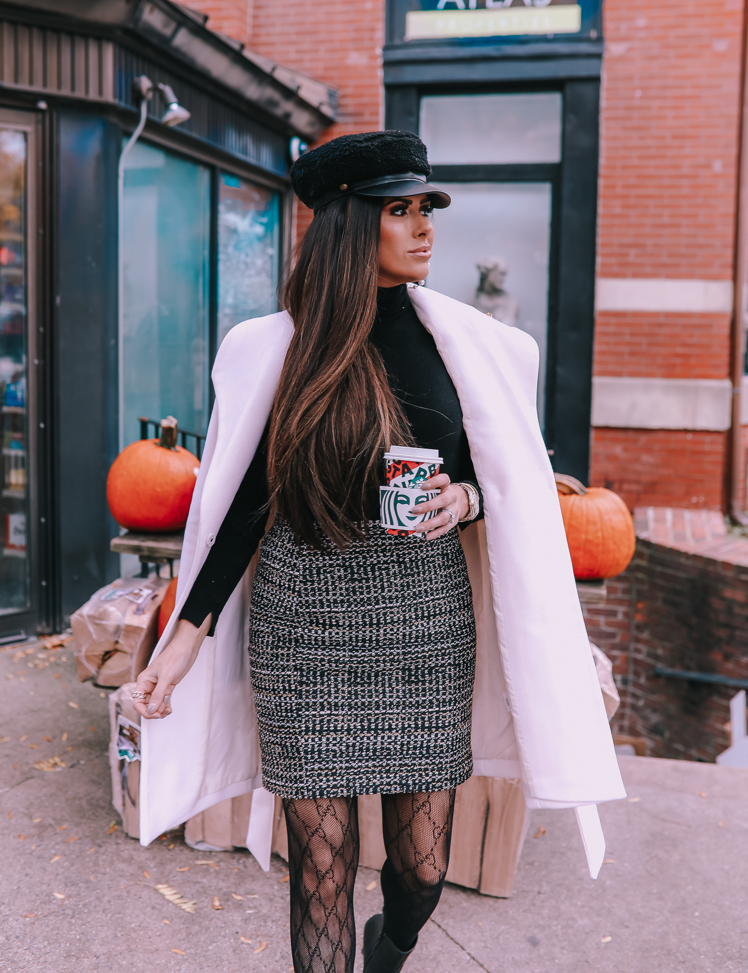 Classic Winter Outfit featured by top US fashion blog, The Sweetest Thing: image of a woman wearing an Express white coat, an Express black turtleneck, an Express tweed skirt, Gucci tights, and a Chanel bag. | gucci tight outfit idea winter fall, coat with chanel brooch, fall outfits white wrap coat, baker boy cap