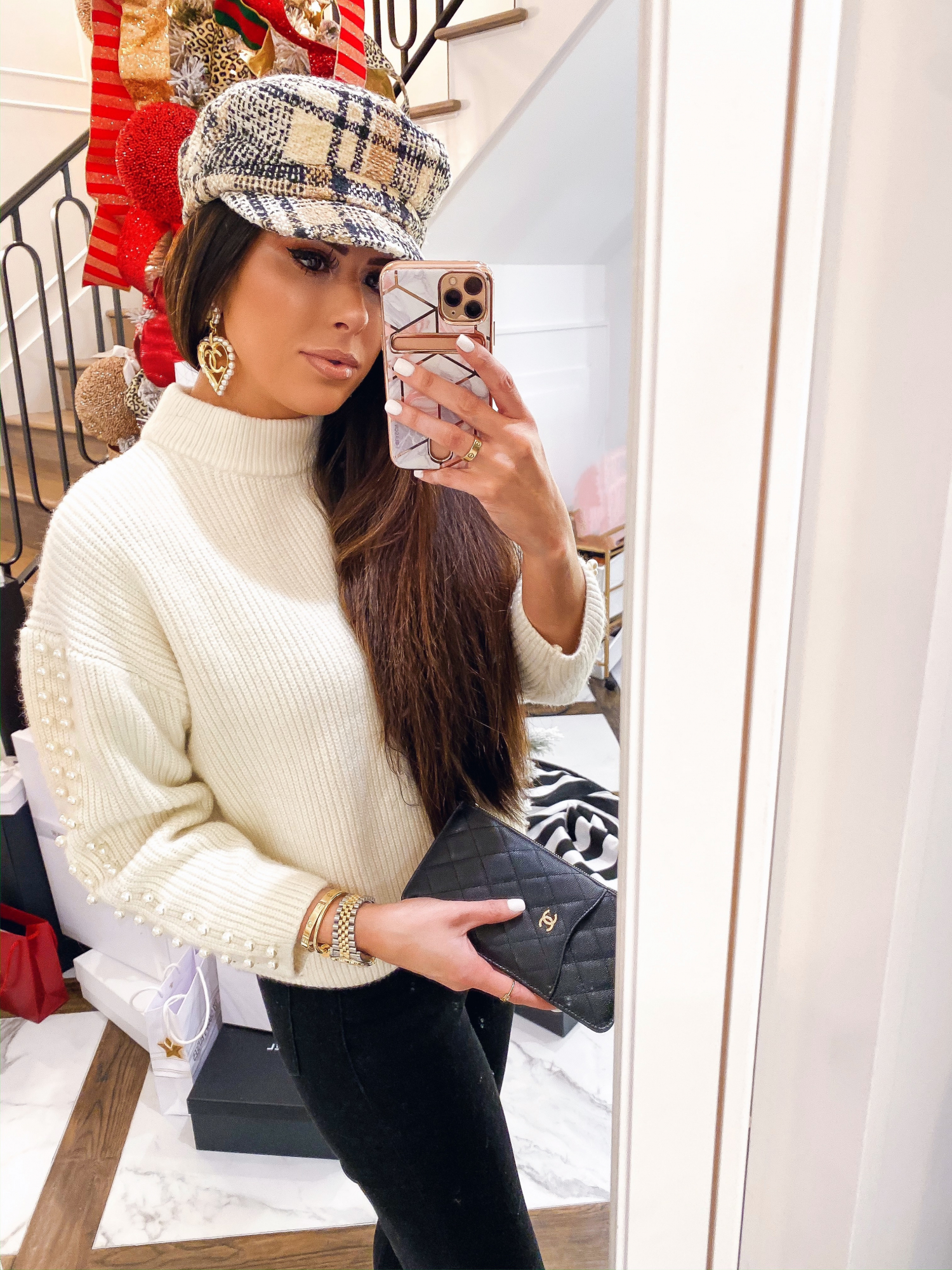 chanel pearl heart earrings, cream sweater pearls on sleeves, chanel phone wallet case | A YEAR IN REVIEW : MASSIVE 2019 INSTAGRAM RECAP by popular Oklahoma life and style blog, The Sweetest Thing: image of a woman wearing a H&M tweed baker hat and H&M Sweater with Pearlescent Beads.