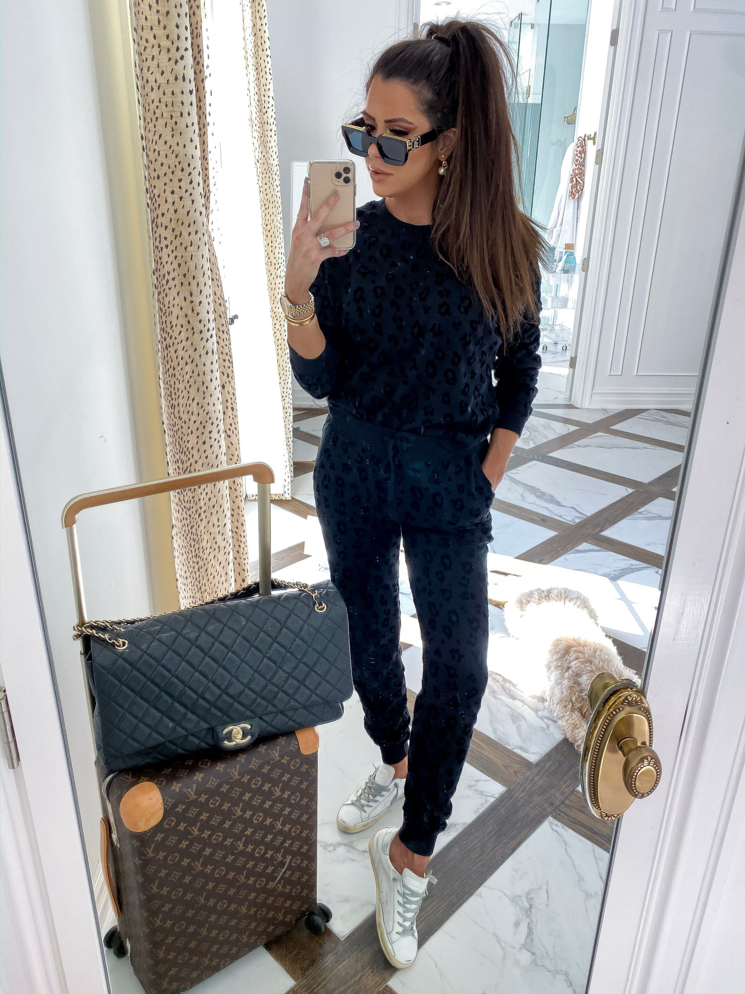 cute travel outfit, z supply leopard outfit, Chanel XXL travel bag, louis vuitton Horizon carryon, Louis vuitton 1.1 millionaire sunglasses | ShopBop Sale by popular US fashion blog, The Sweetest Thing: image of a woman wearing a ShopBop Z Supply The Animal Flocked Pullover and ShopBop Z Supply The Animal Flocked Joggers.