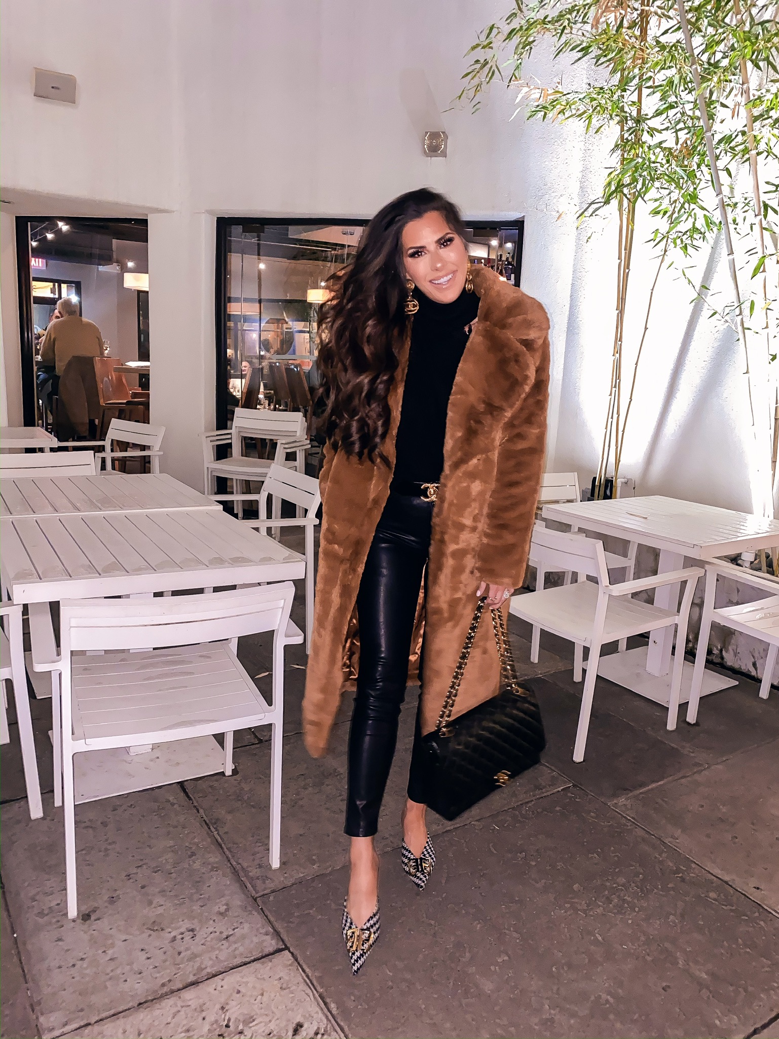 Instagram Recap by popular US fashion blog, The Sweetest Thing: image of a woman wearing a Chanel belt, Nordstrom High Waist Coated Skinny Jeans 1822 DENIM, Revolve Arlington Sweater Lovers + Friends brand:Lovers + Friends, Nordstrom Longline Faux Fur Coat NA-KD, and holding a Chanel Maxi purse. 