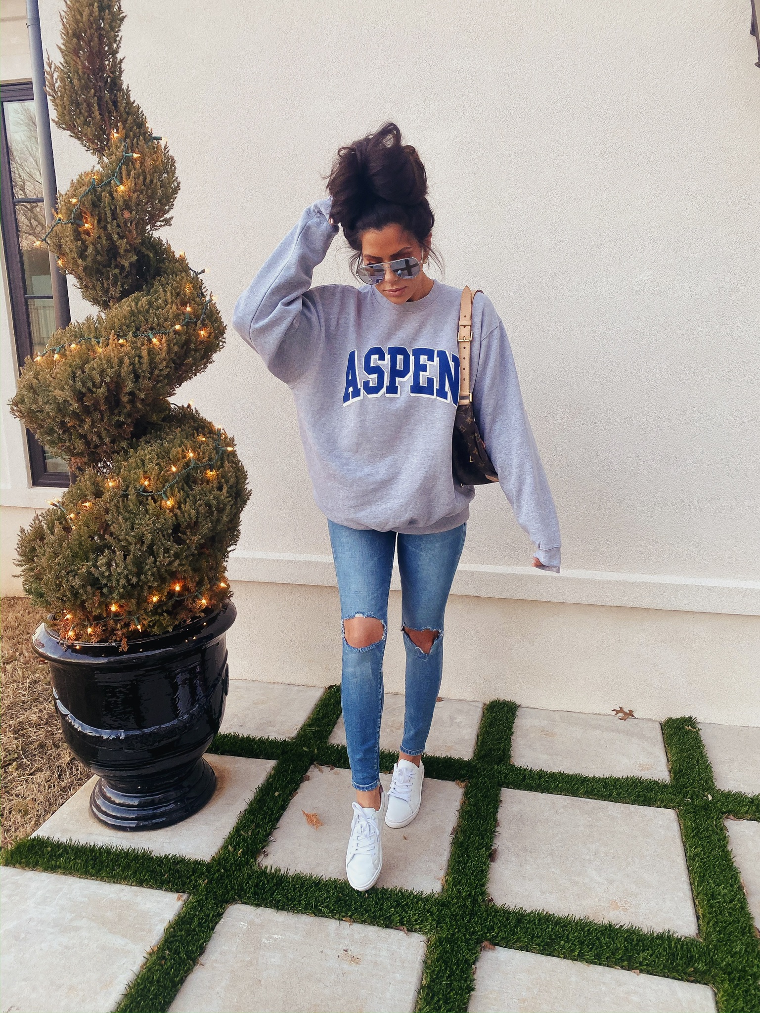 Instagram Recap by popular US fashion blog, The Sweetest Thing: image of a woman wearing a Aspen sweatshirt, Louis Vuitton bumbag, and Steve Madden GLOVE NATURAL SNAKE.