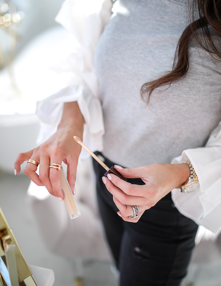 sephora haul january 2020, fenty fussy lipgloss review, beauty blogger 2020, emily gemma, tatcha serum stick, PTR pumpkin enzyme mask-8 | Sephora Haul by popular US beauty blog, The Sweetest Thing: image of a woman holding Hourglass conceler. 