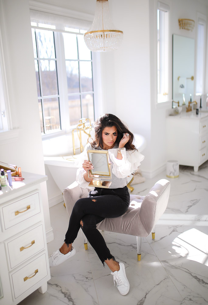 Sephora Haul by popular US beauty blog, The Sweetest Thing: image of a woman applying Fenty eyeliner. 