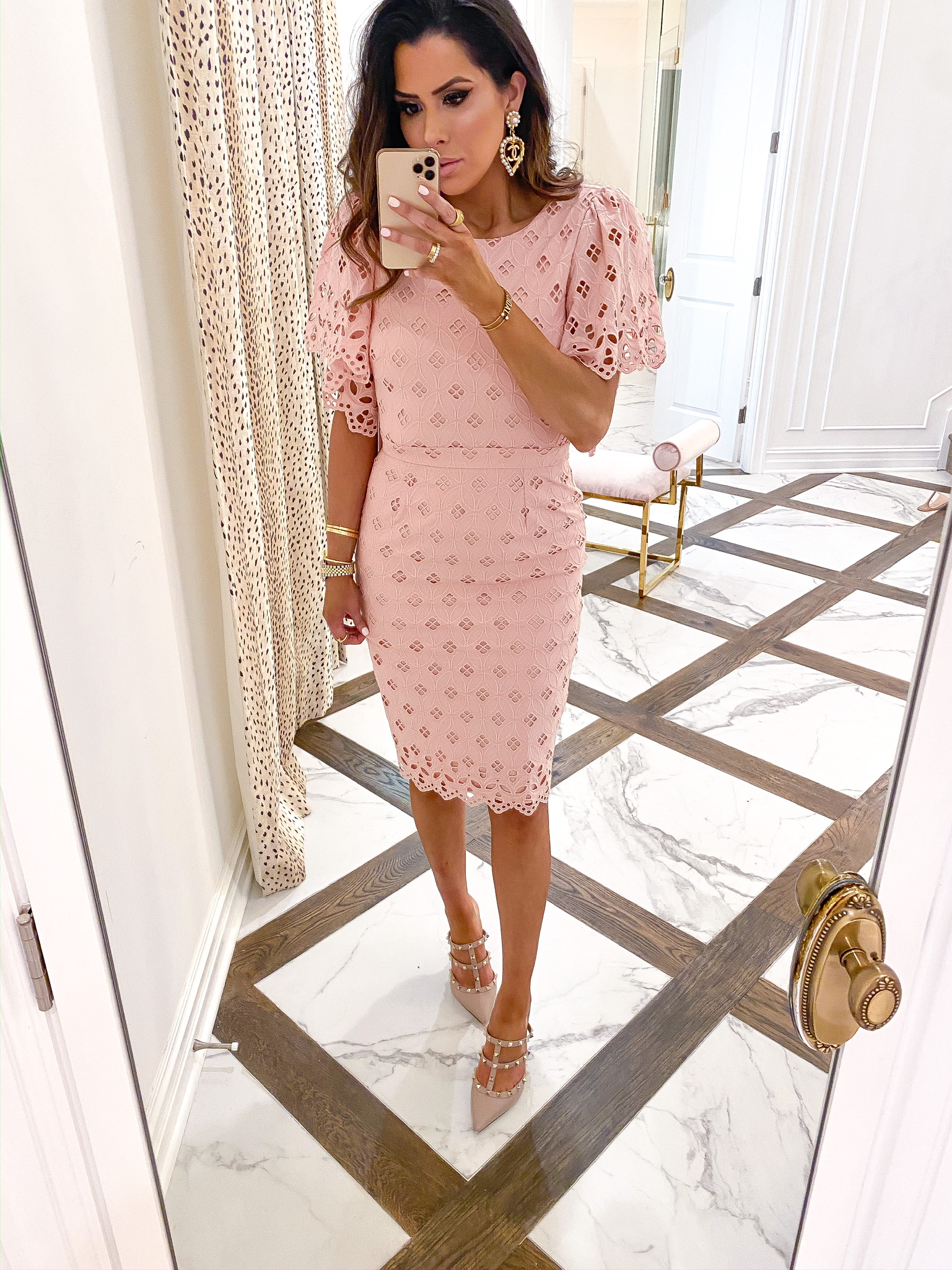 Valentine's Day Outfit Ideas by popular US fashion blog, The Sweetest Thing: image of a woman wearing a Nordstrom Eyelet Sheath Dress RACHEL PARCELL, Nordstrom Rockstud T-Strap Pump VALENTINO GARAVANI, Chanel earrings, Cartier rings, and Dior and Cartier bracelets. 