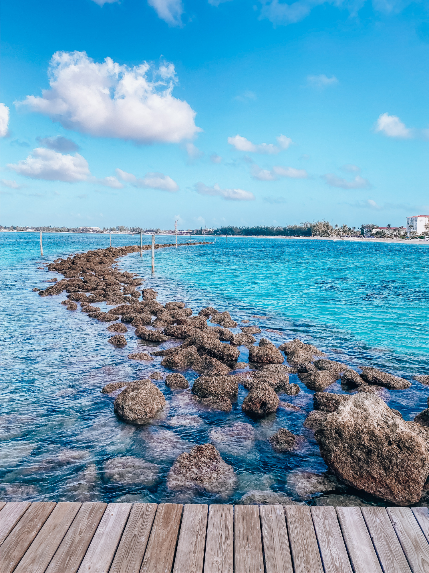 bahamas bahamar water view review | What to Wear in the Bahamas by popular US travel blog, The Sweetest Thing: image of pier and the Caribbean ocean. 