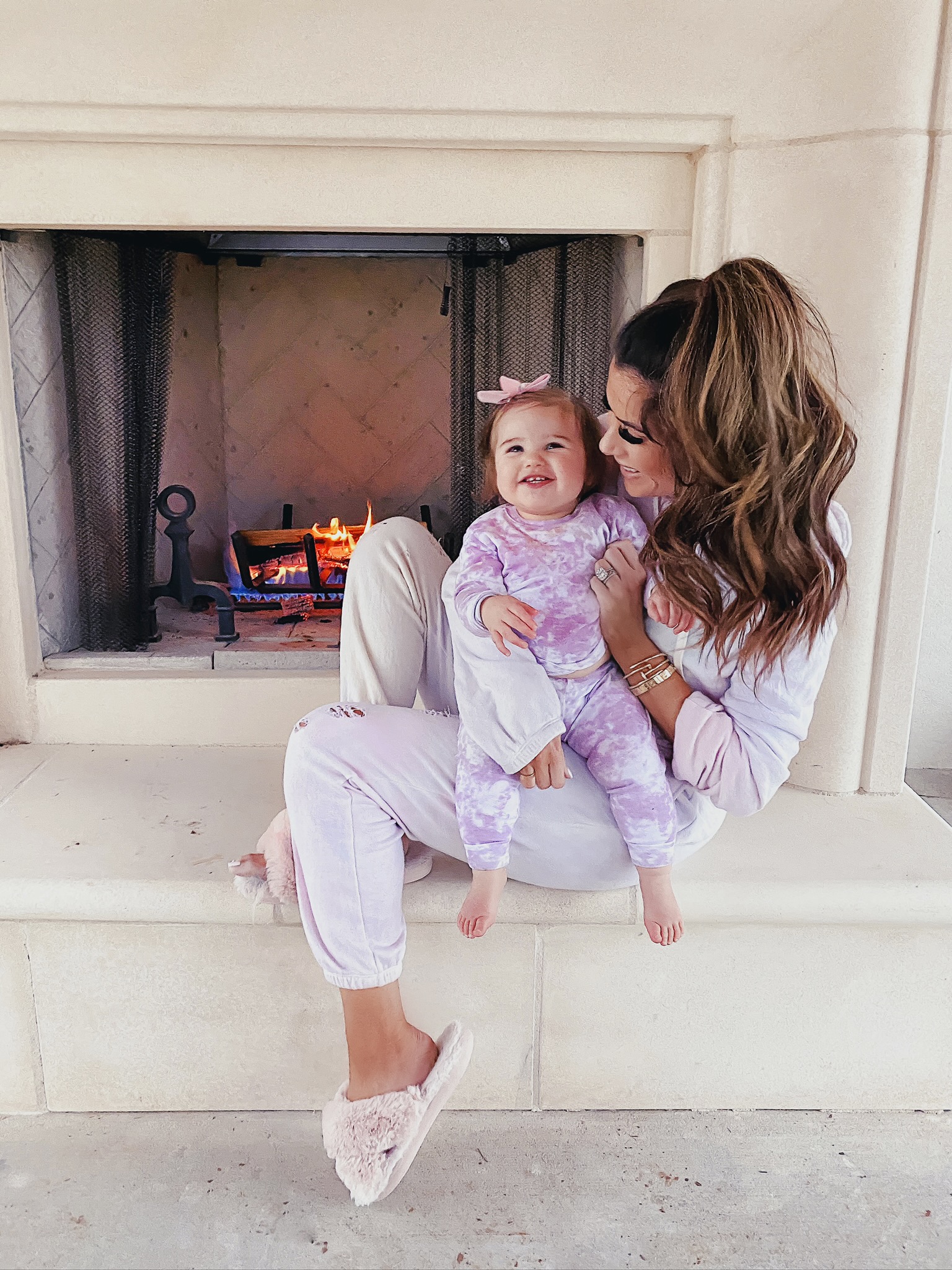 Comfortable Loungewear by popular US fashion blog, The Sweetest Thing: image of Emily Gemma wearing a Z Supply The Pale Blush Rugby Stripe Weekender Sweater and Nordstrom Zella leggings.| Comfortable Loungewear by popular US fashion blog, The Sweetest Thing: image of Emily Gemma and her daughter Sophie wearing a n:philanthropy GAMBLE SWEATSHIRT, n: philanthropy DERBY JOGGER, Amazon HALLUCI Women's Cross Band Soft Plush Fleece House Indoor or Outdoor Slippers, and Amazon VAENAIT BABY 12M-12 Toddler Kids Boys Girls 100% Cotton Marbling Sung Fit Sleepwear Pajamas.