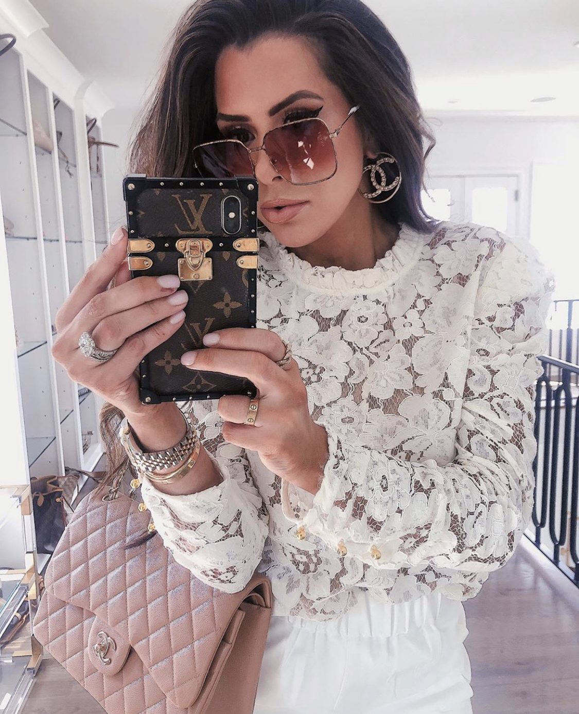 ShopBop Sale by popular US fashion blog, The Sweetest Thing: image of a woman wearing a ShopBop WAYF Emma Puff Sleeve Lace Top.