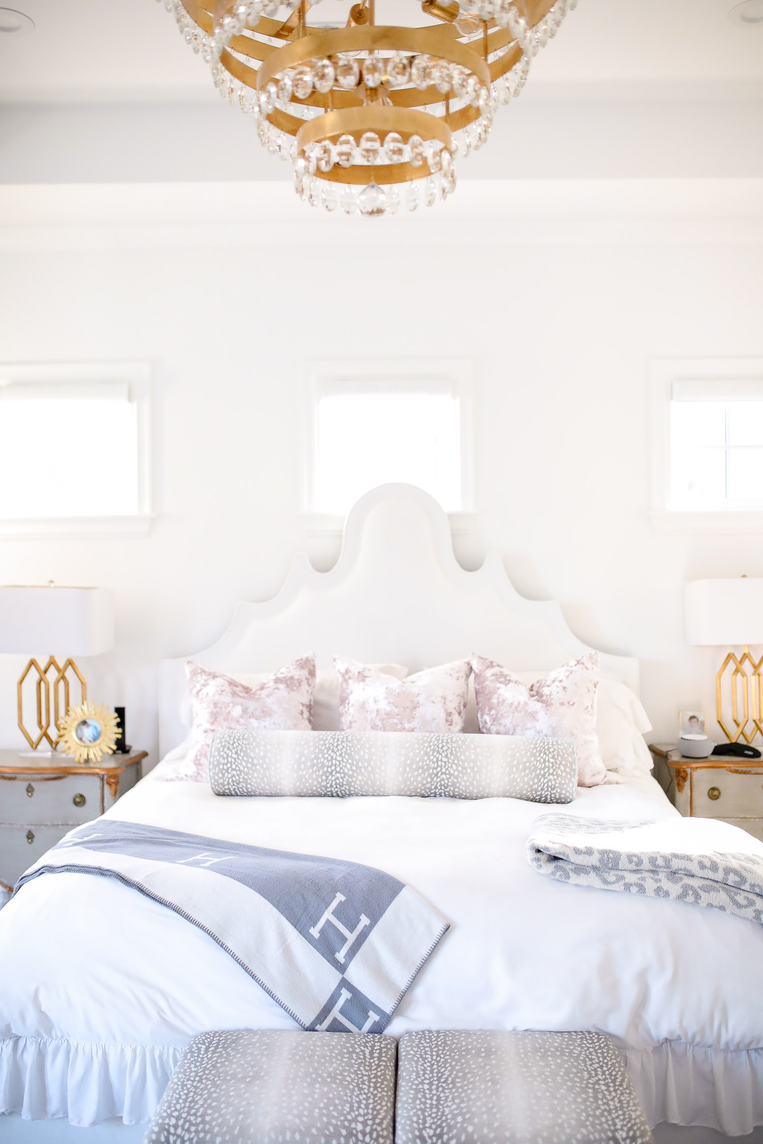 Instagram Recap by popular US lifestyle blog, The Sweetest Thing: image of a bedroom decorated with a Wayfair nightstand, Wayfair Meela Queen Standard Bed, Horchow Prescott Triple Table Lamp, Etsy Lavish Velvet // Mist Pillow COVER, Etsy The Little Bolster : Antelope Linen Print, Nordstrom Leopard Throw Blanket NORDSTROM, Wayfair Buckhead 6-Light Candle Style Classic / Traditional Chandelier, Horchow Crystorama Perla 5-Light Chandelier, and Etsy The Skirted Ottoman : Antelope Linen Print.
