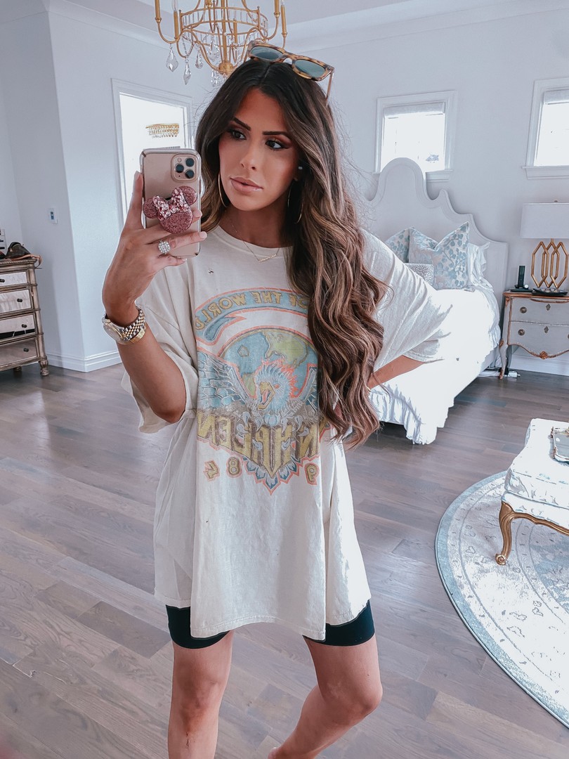 Oversized Vintage Band Tee styled by top US fashion blog, The Sweetest Thing | Instagram Recap by popular US life and style blog, The Sweetest Thing: image of Emily Gemma wearing a Urban Outfitter band tee, BP. Black biker shorts, Urban Outfitters Sunglasses, and Nadri Hoop Earrings.  